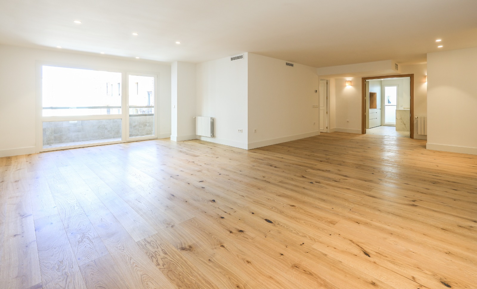 Exclusiva vivienda  a estrenar con plaza de garaje en Argüelles