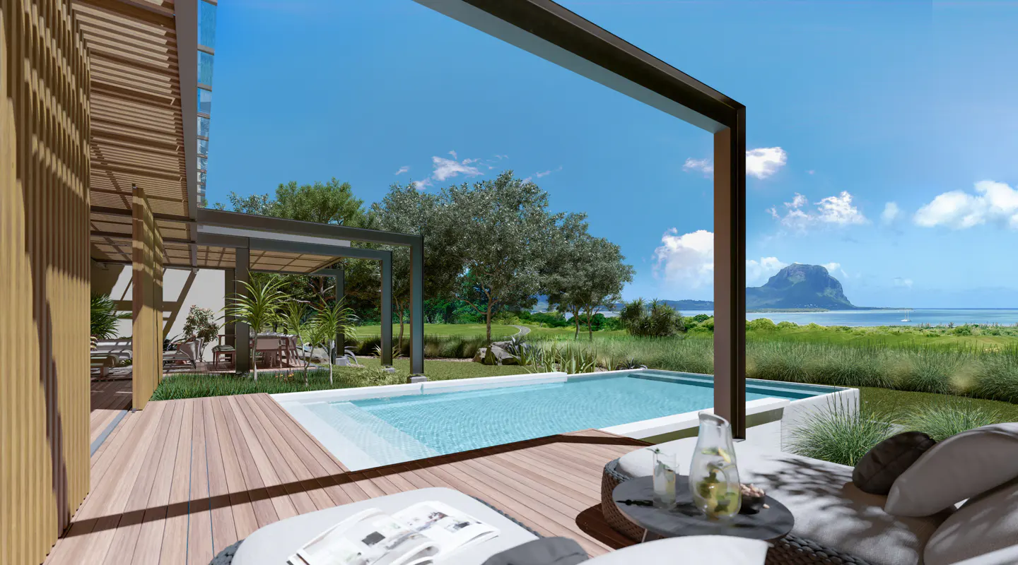 Luxury villa with a pool overlooking the ocean and a mountain in the distance. Wooden deck with lounge furniture. Blue sky.