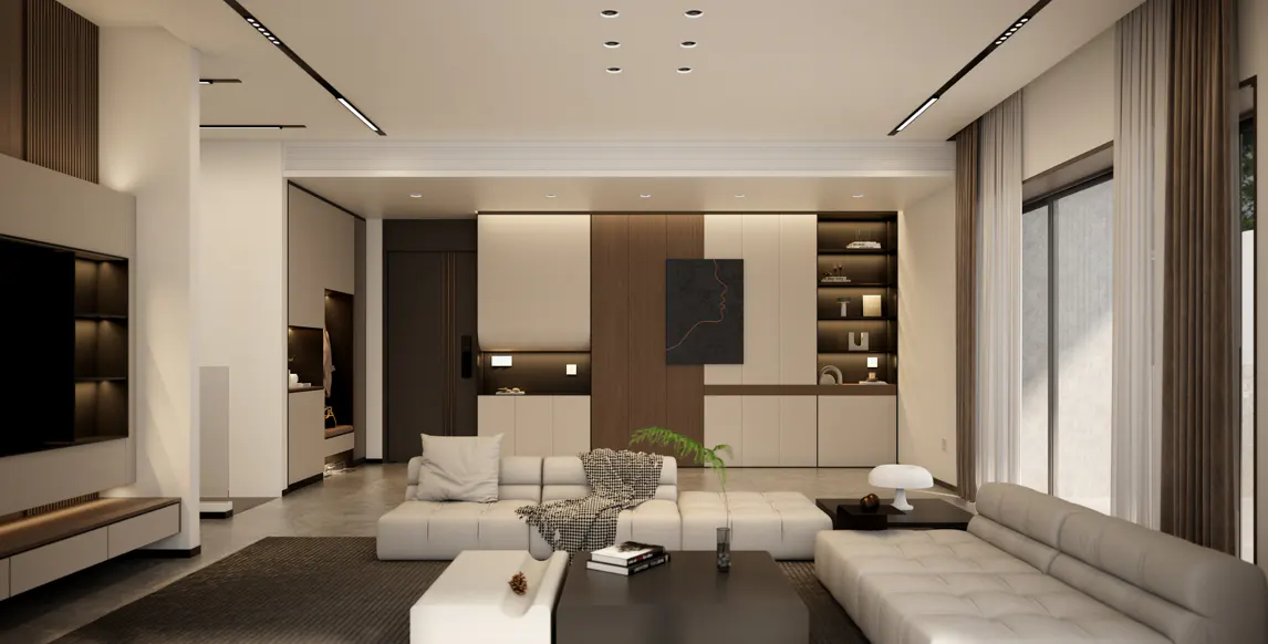 A modern living room with white sofas, a dark coffee table, and built-in shelving. Neutral colors and clean lines create a minimalist aesthetic.