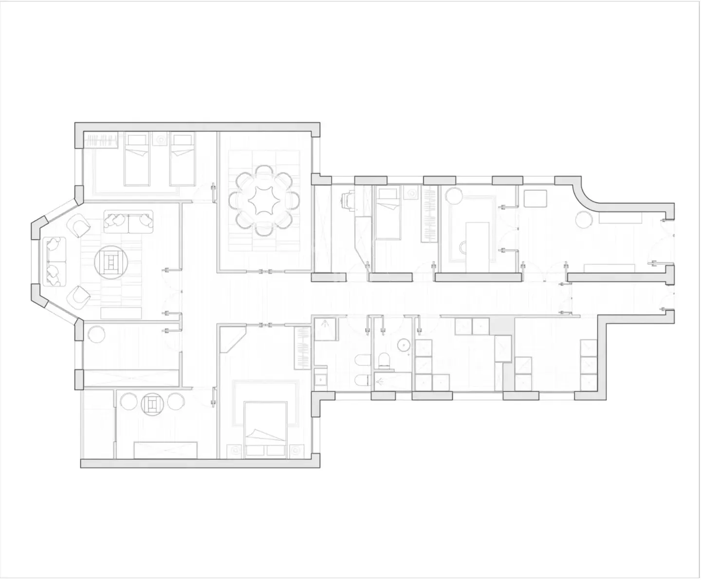 Architectural floor plan of a house, showing the layout of rooms, furniture, and fixtures in a line drawing.