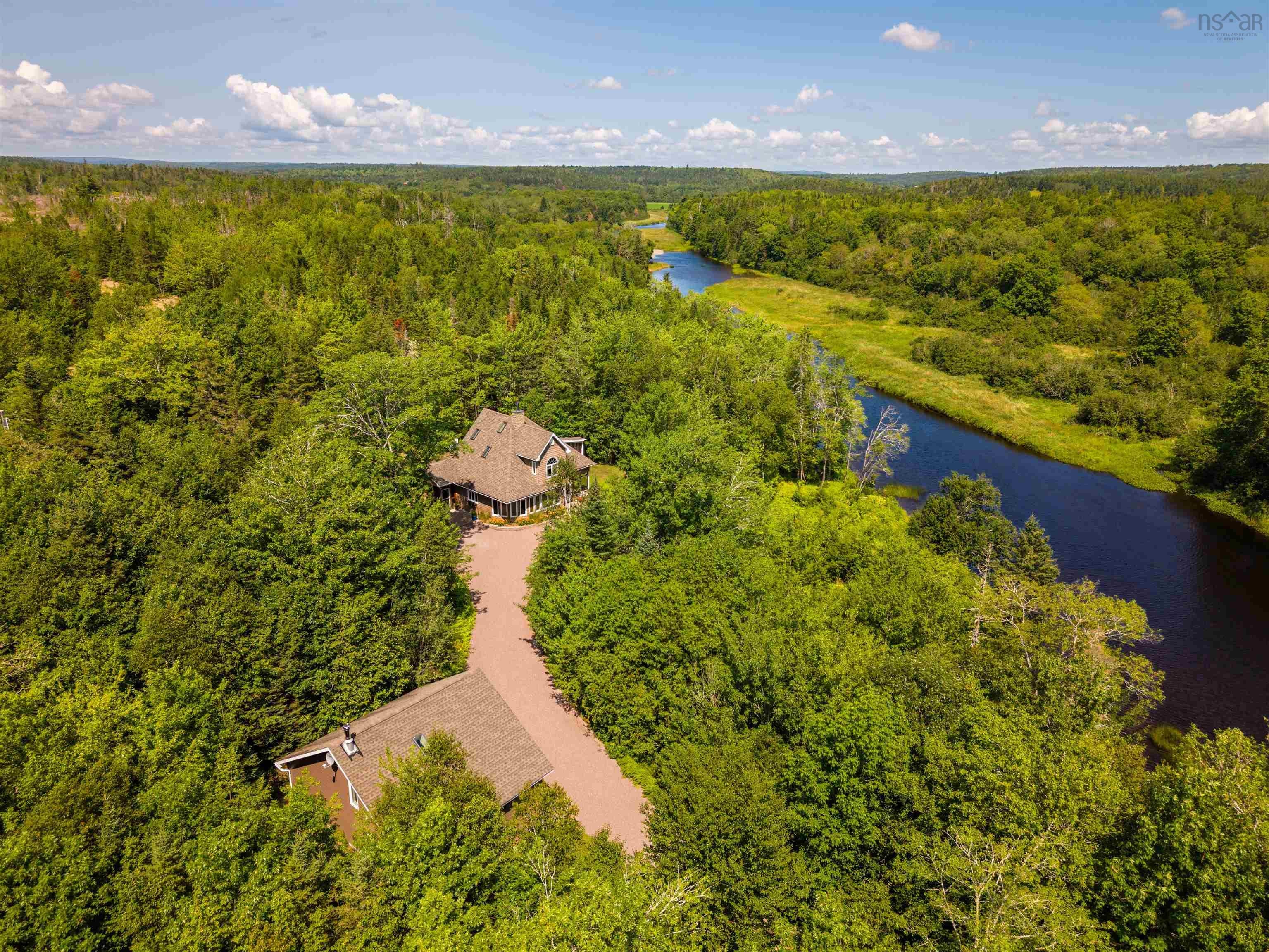 2.66-Acre Riverfront Home: Easy One-Level Living in Aspen NS