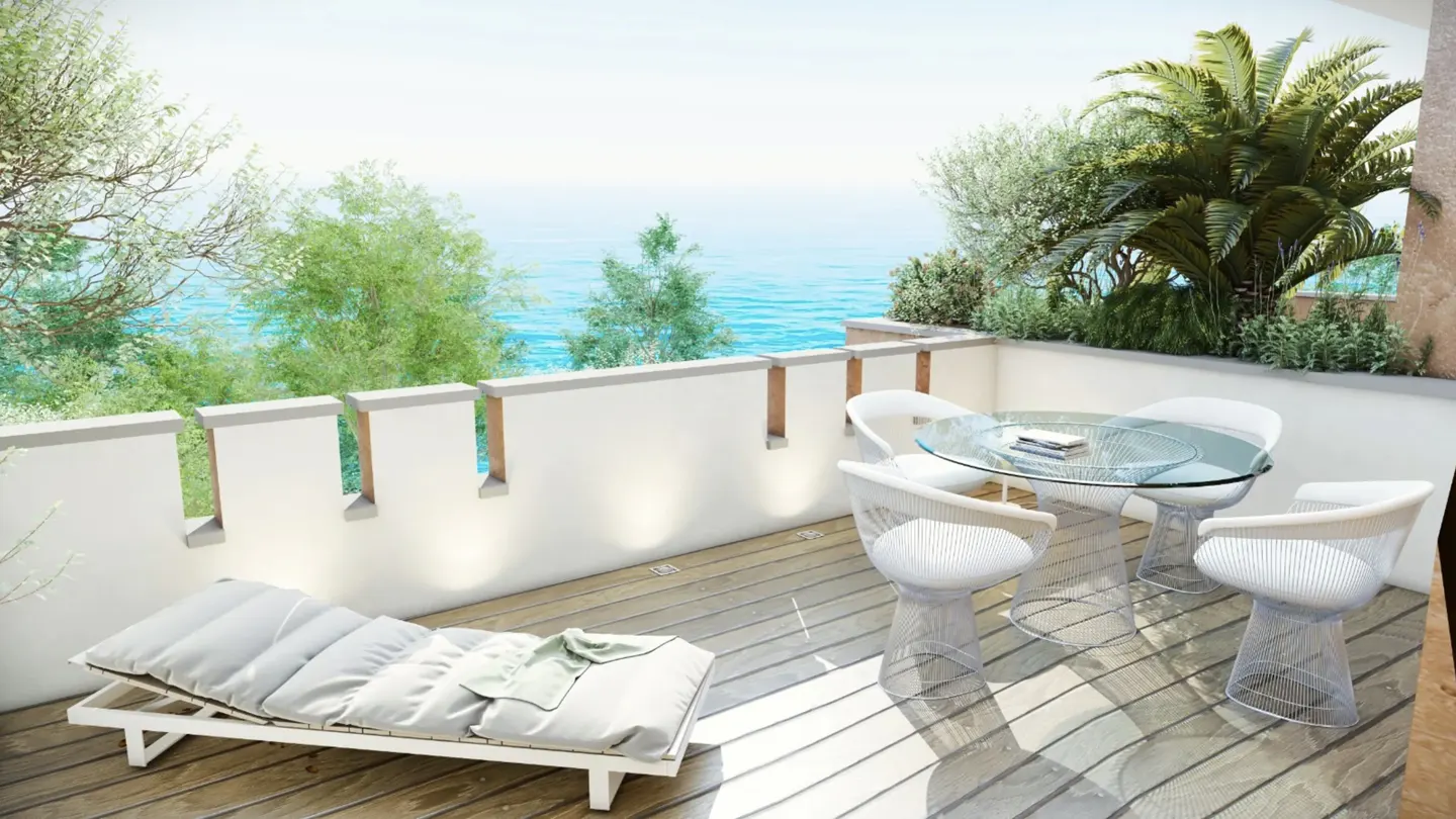 Balcony with ocean view, white lounge chair, glass table, and four white chairs on a wooden deck.