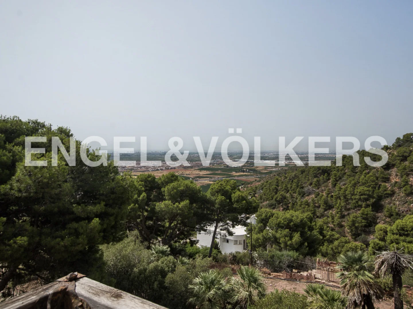 Exclusive plot with sea and mountain views.
