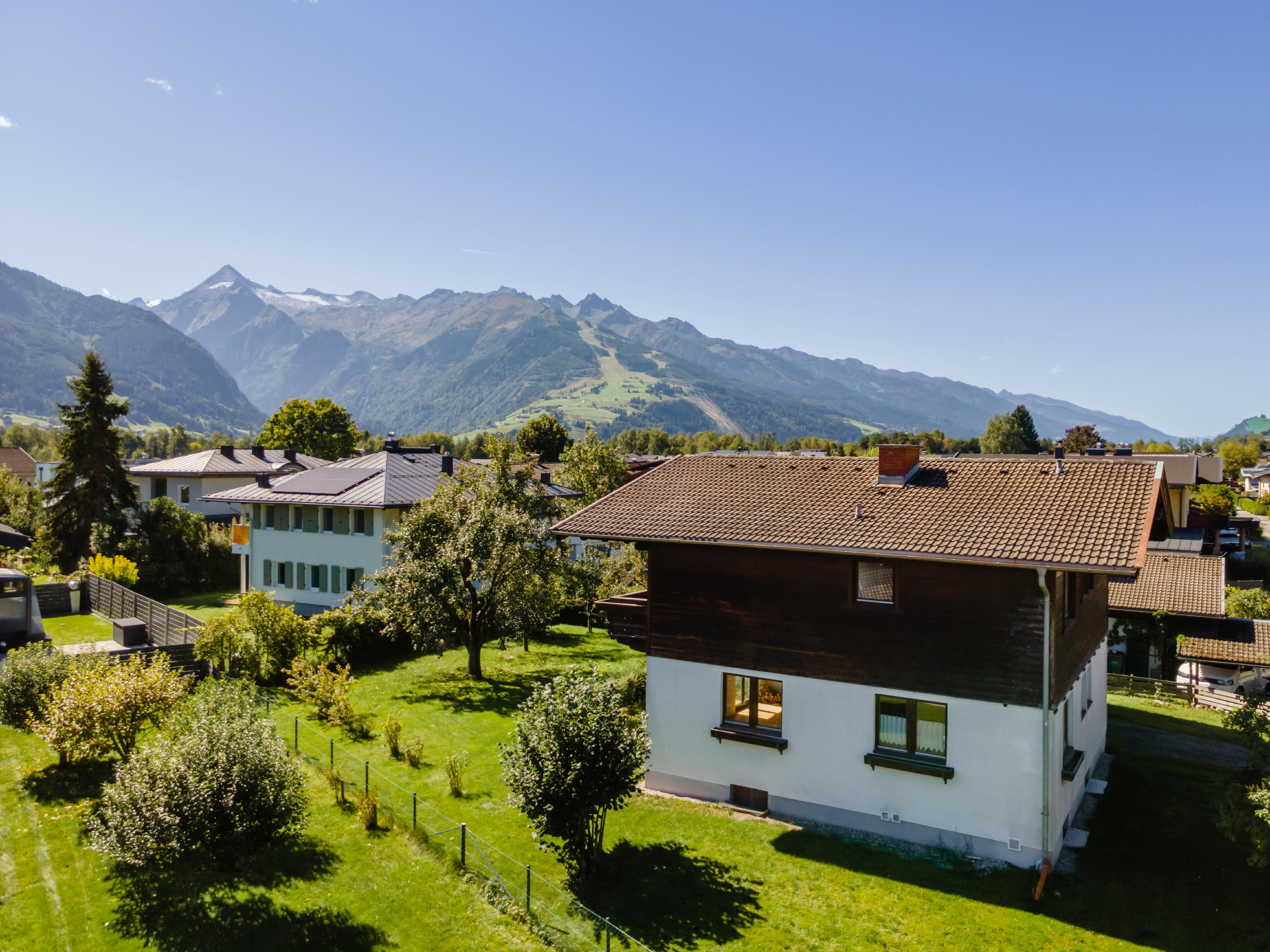 Sunny plot with existing buildings and glacier views