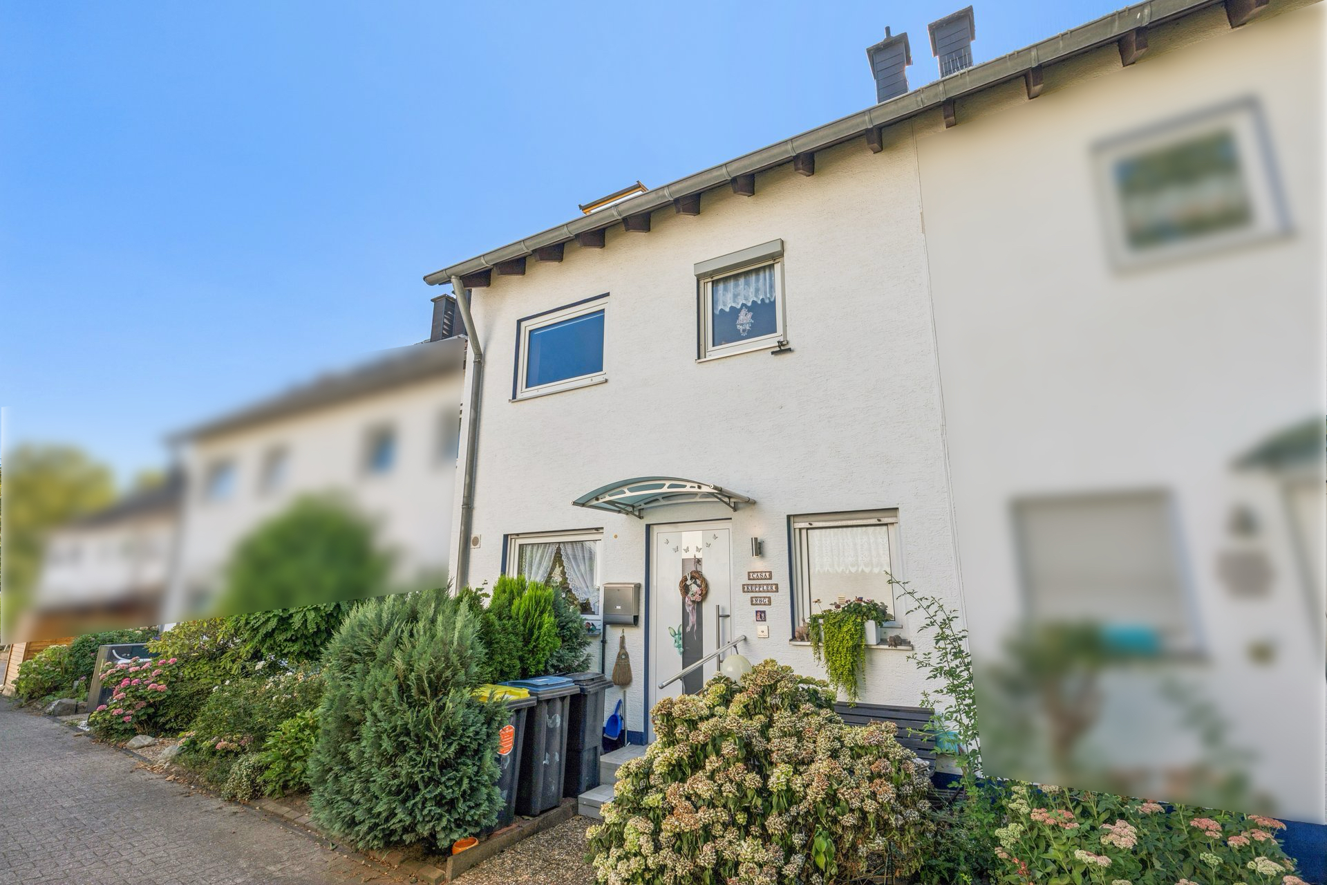Gepflegtes Reihenmittelhaus mit Wintergarten in ruhiger Lage von Köln-Pesch