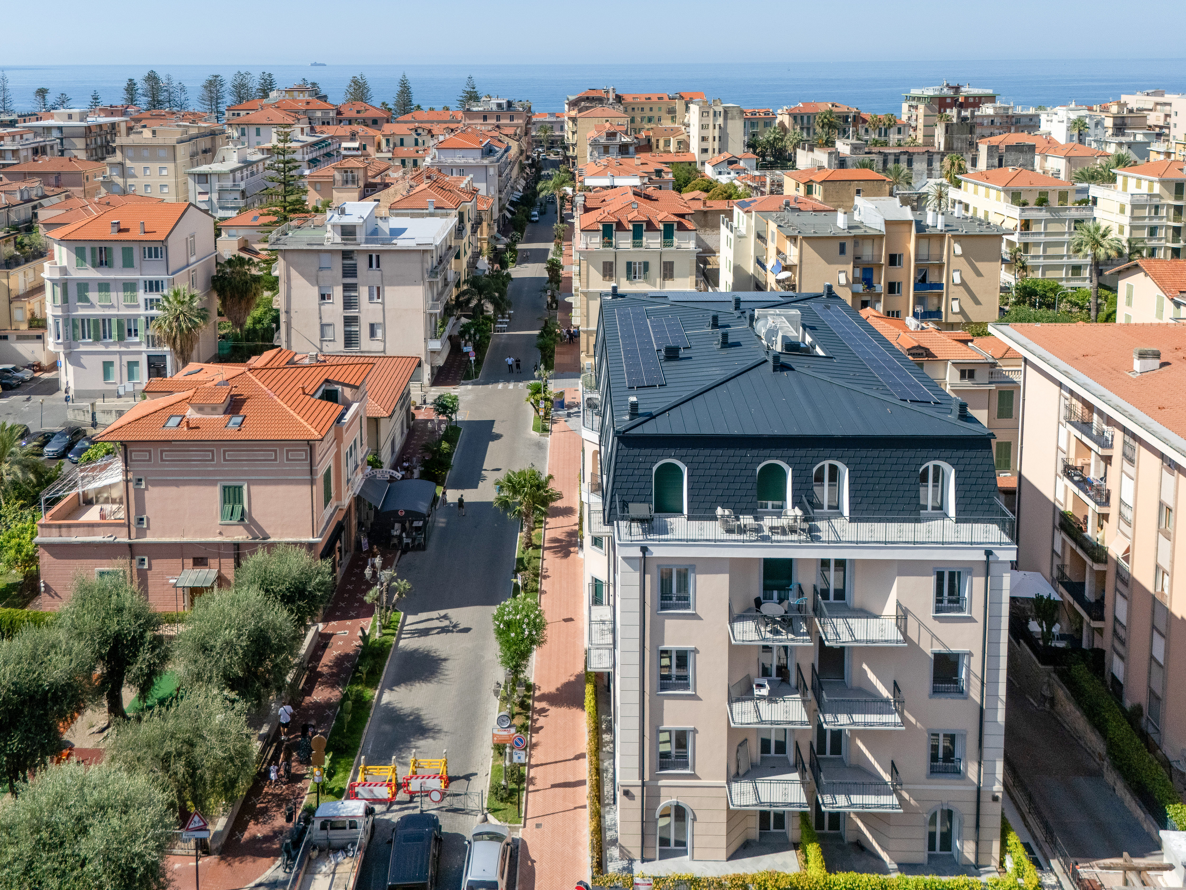 Three-room apartment on the second floor with a balcony and a window overlooking the city.
