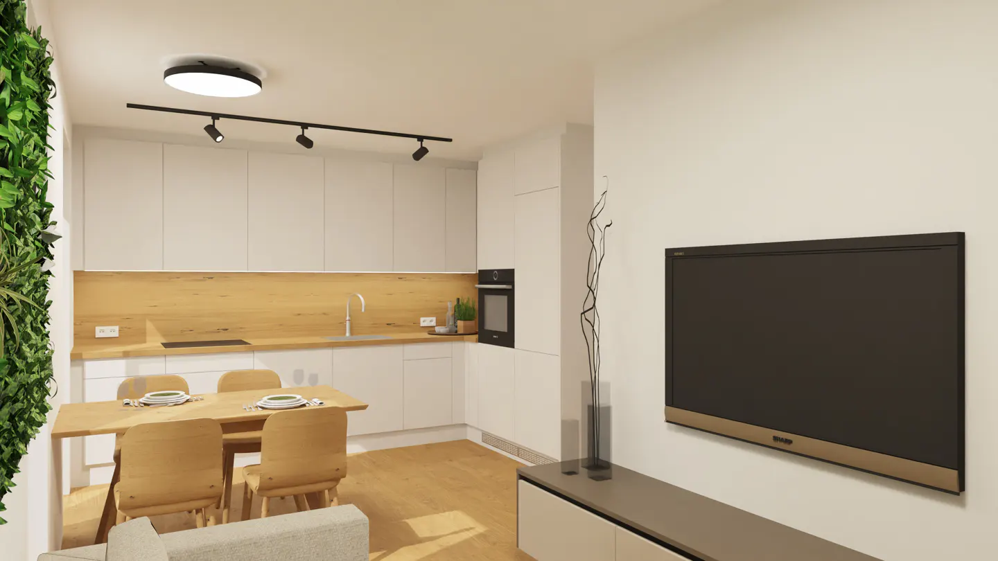 A modern apartment interior with white cabinets, a wooden table with four chairs, and a large television on the wall.