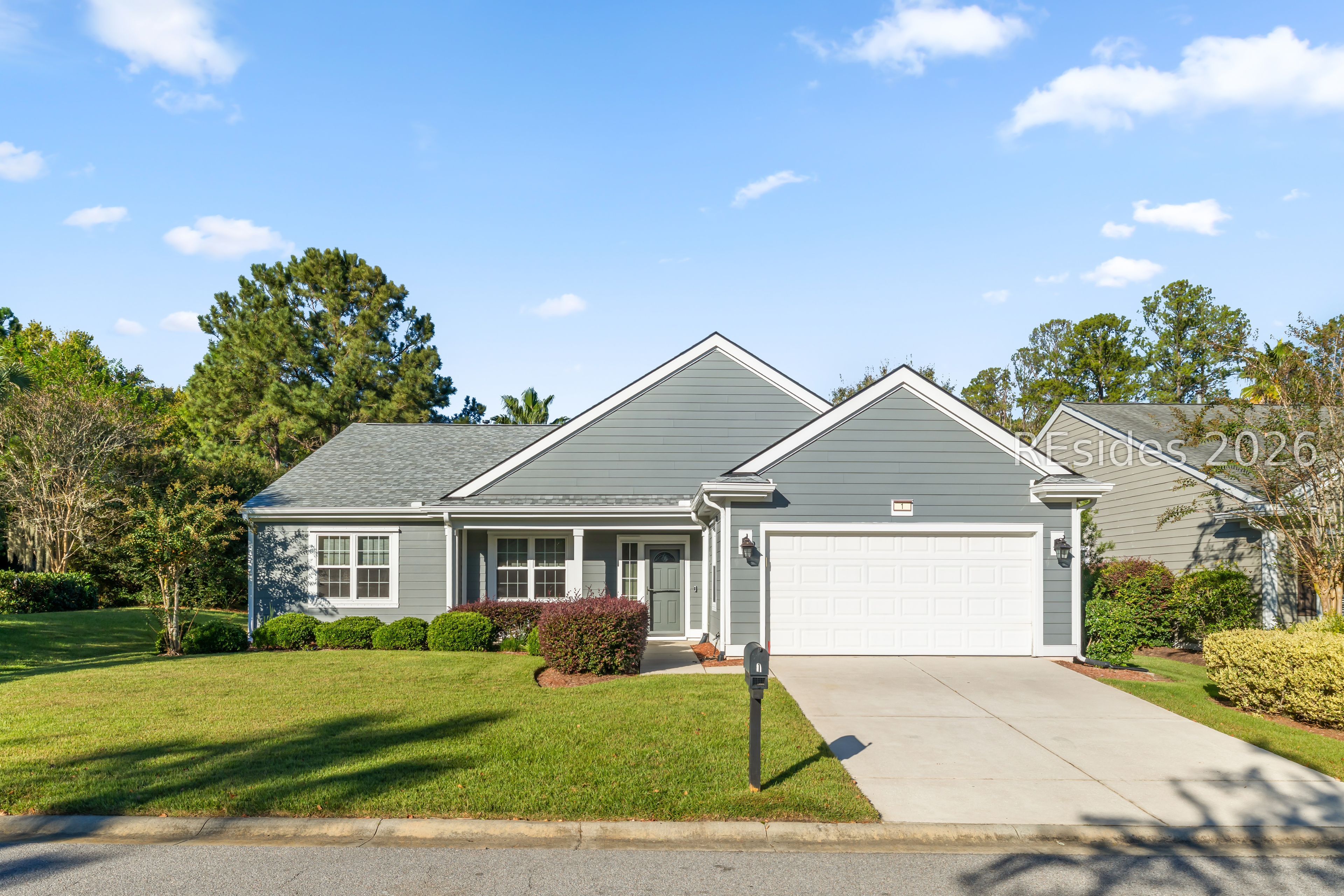Fresh Updates Inside & Out on Corner Lot with Lagoon View