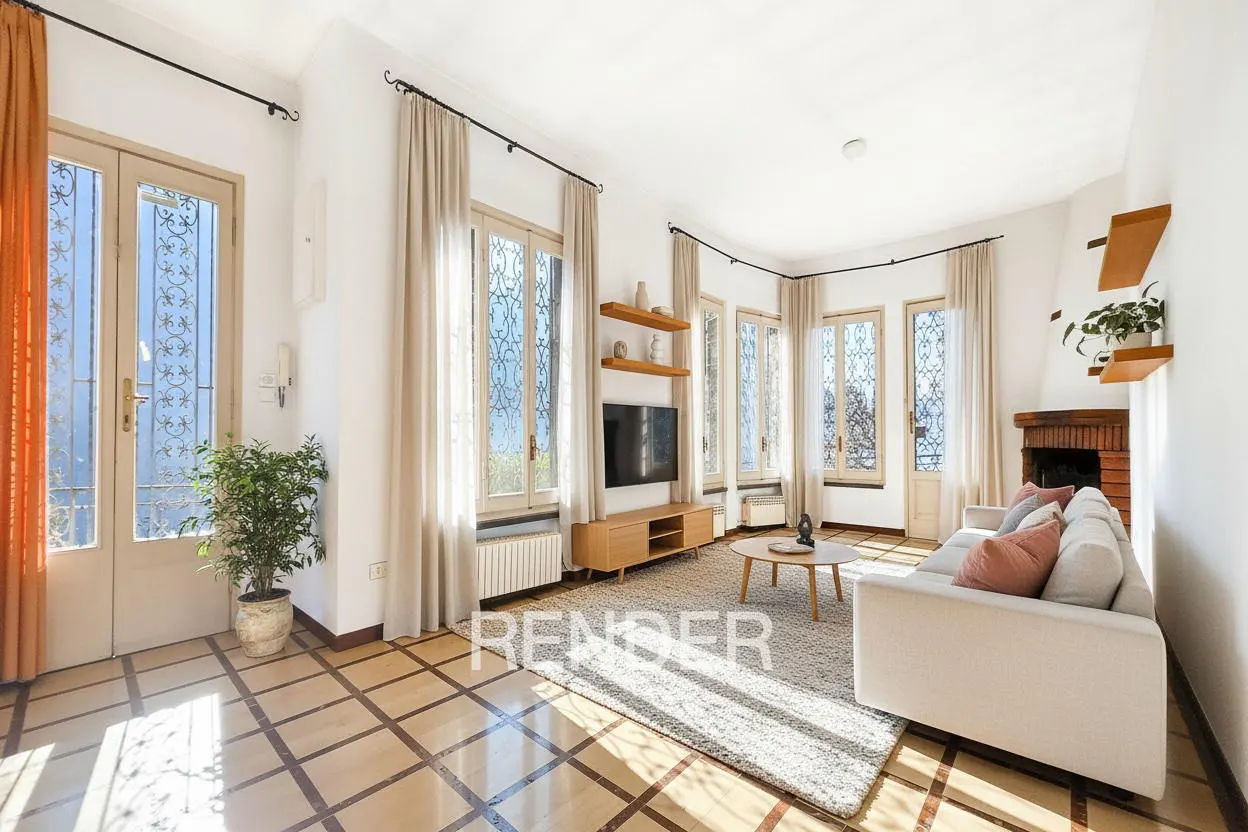 Bright living room with a white sofa, wood floors, and large windows with sheer curtains. A TV and fireplace add to the cozy atmosphere.