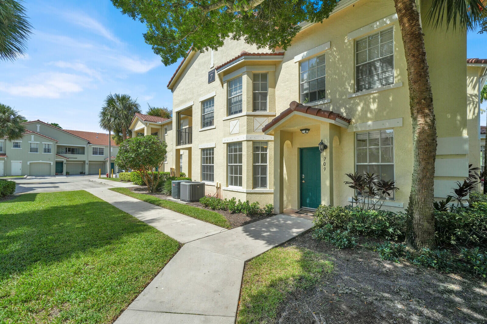 Single-Level Elegance with Pool, Garage and Waterfront Views