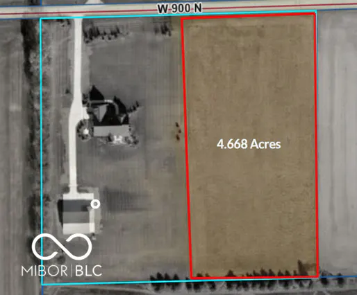 Aerial view of a 4.668-acre lot outlined in red, adjacent to a property with a house and long driveway. Blue border marks total property.