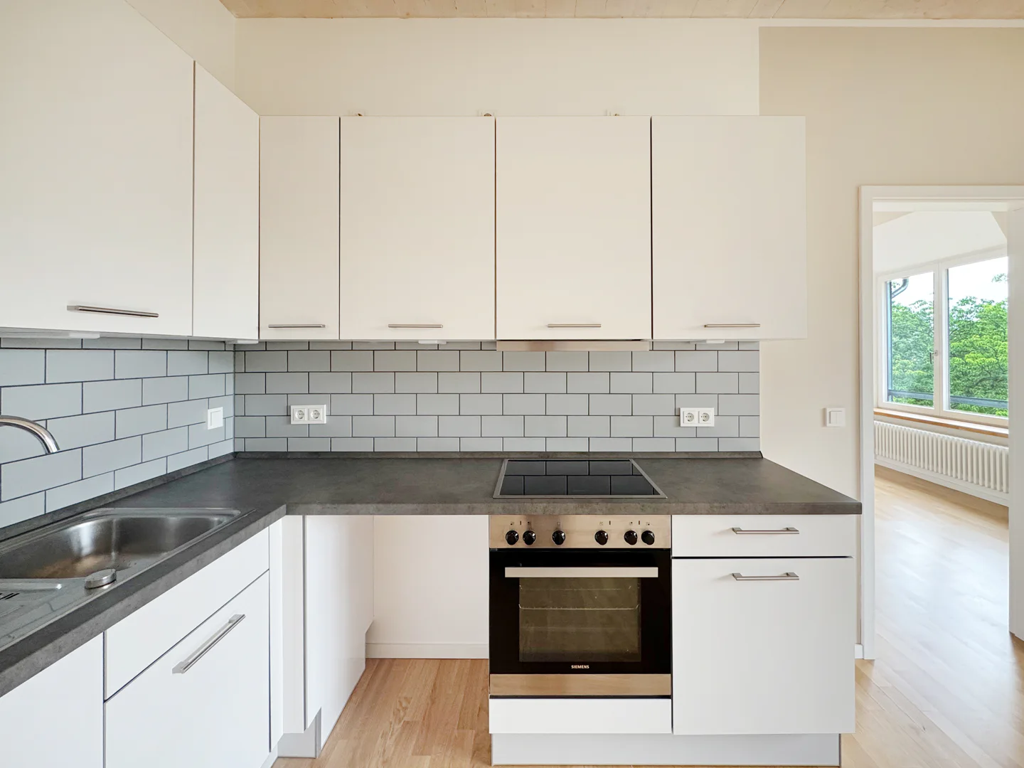 Lichtdurchflutete Dachgeschosswohnung mit privater Aufdachterrasse - Foto 3