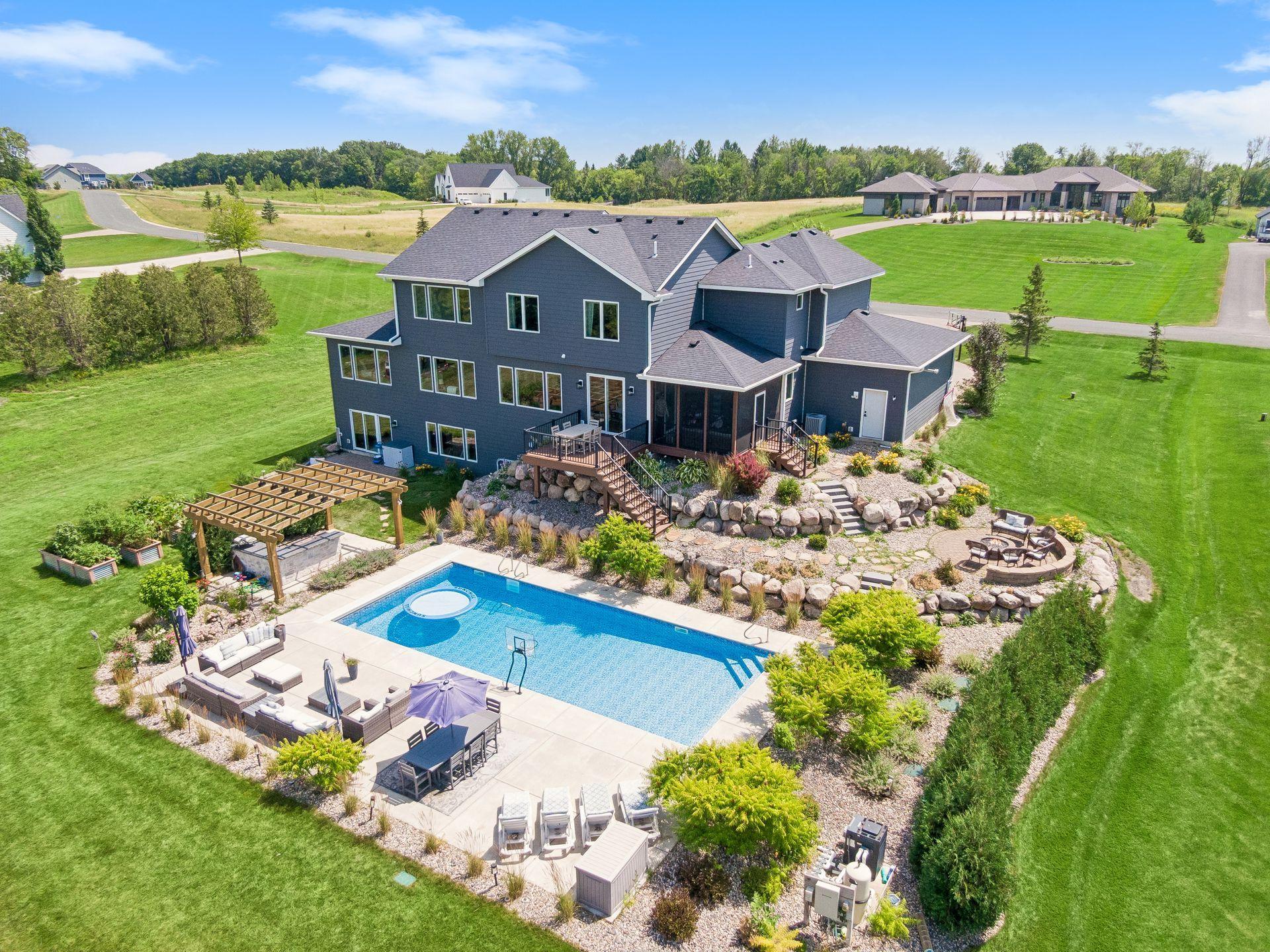 3.17-Acre Custom Home with Saltwater Pool in Prior Lake