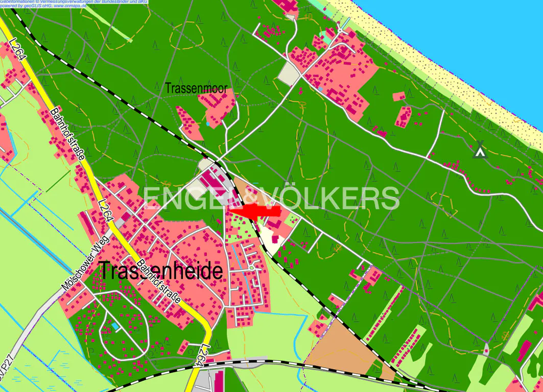 Map of Trassenheide, Germany, with a red arrow indicating a property location near Bahnhofstraße and Trassenmoor.
