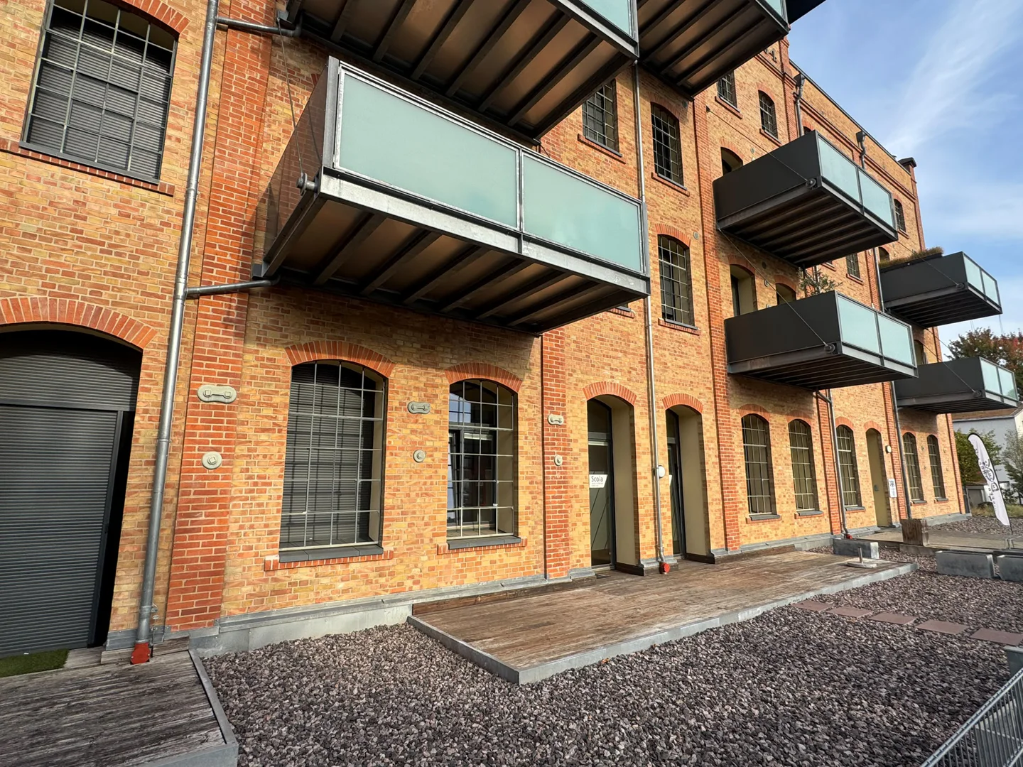 Einzigartiges Loft in der denkmalgeschützten Filzfabrik – mit Terrasse und Tiefgaragenstellplatz - Photo 4