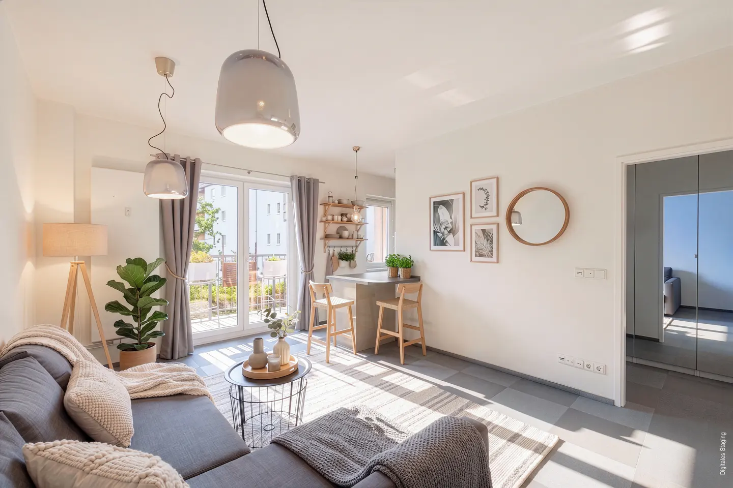 Bright, modern living room with gray sofa, wood accents, and natural light streaming in from a balcony.