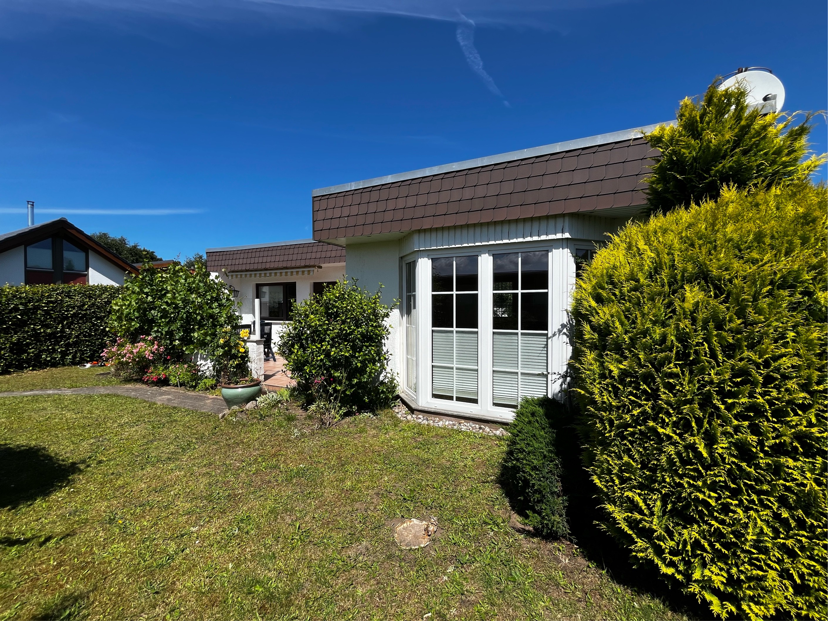 Bungalow mit idyllischem Gartengrundstück & Pkw-Stellplatz - ruhig & strandnah gelegen
