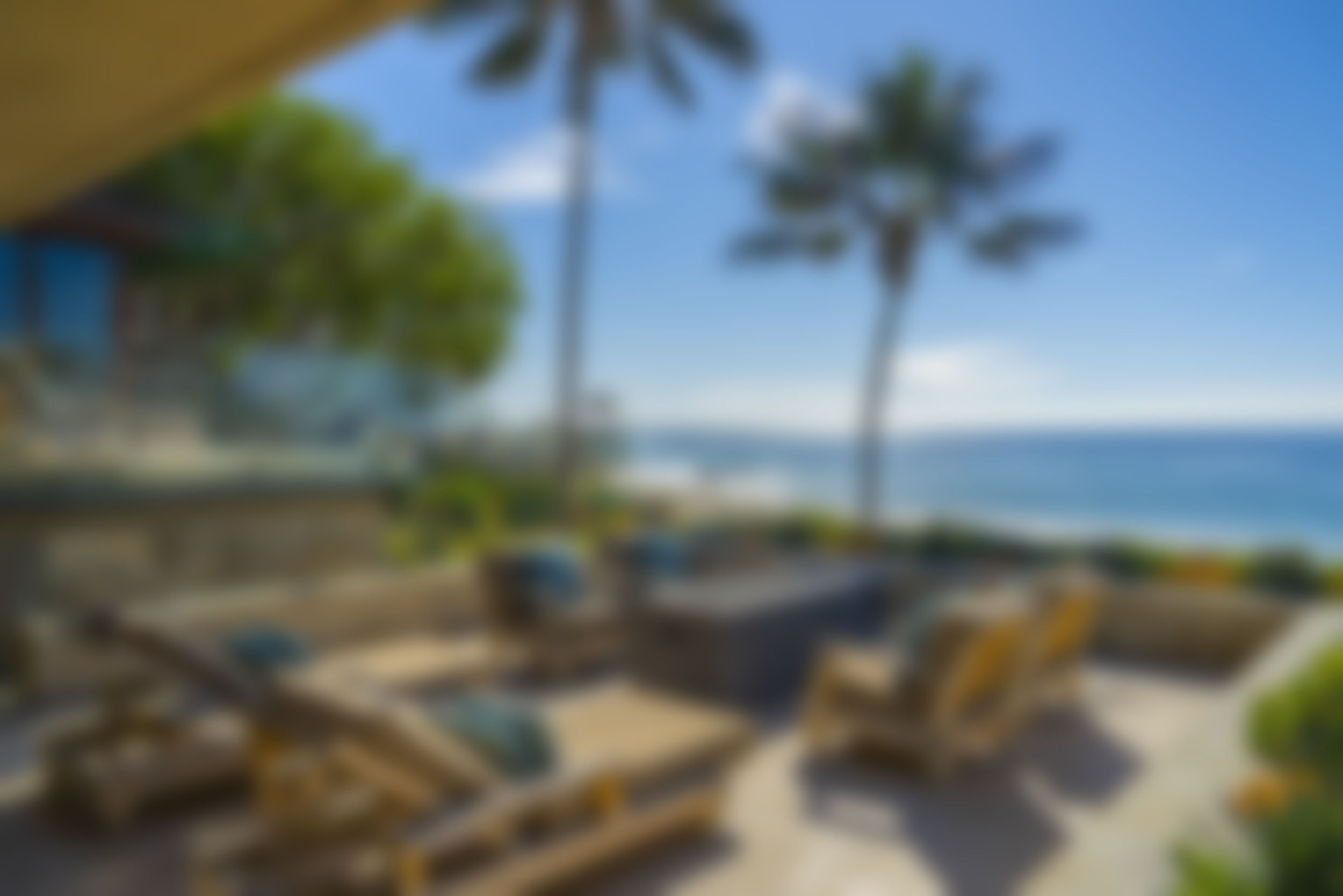 Two Homes, One Extraordinary Gated Opportunity on the Sand