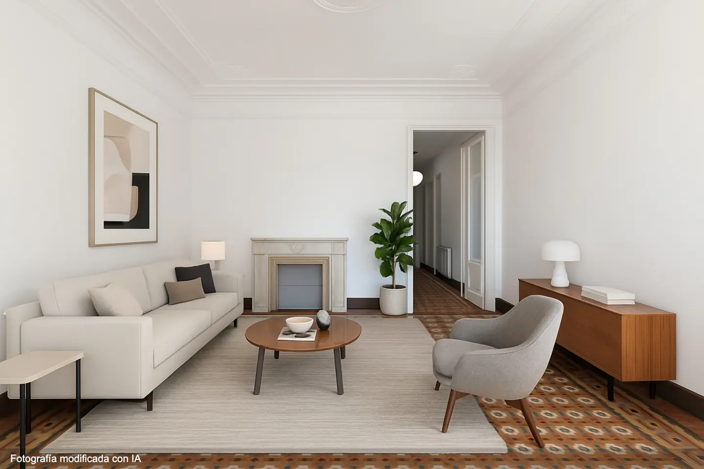 Bright living room with white walls, a beige sofa, a fireplace, and a round coffee table on a patterned rug.
