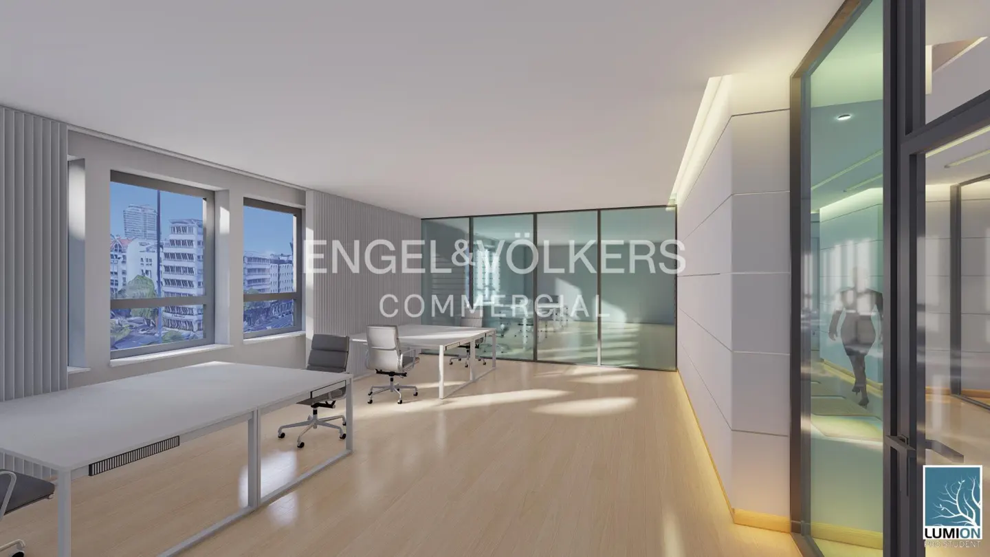 Modern office with white desks, grey chairs, light wood floors, and glass partitions overlooking a city street.