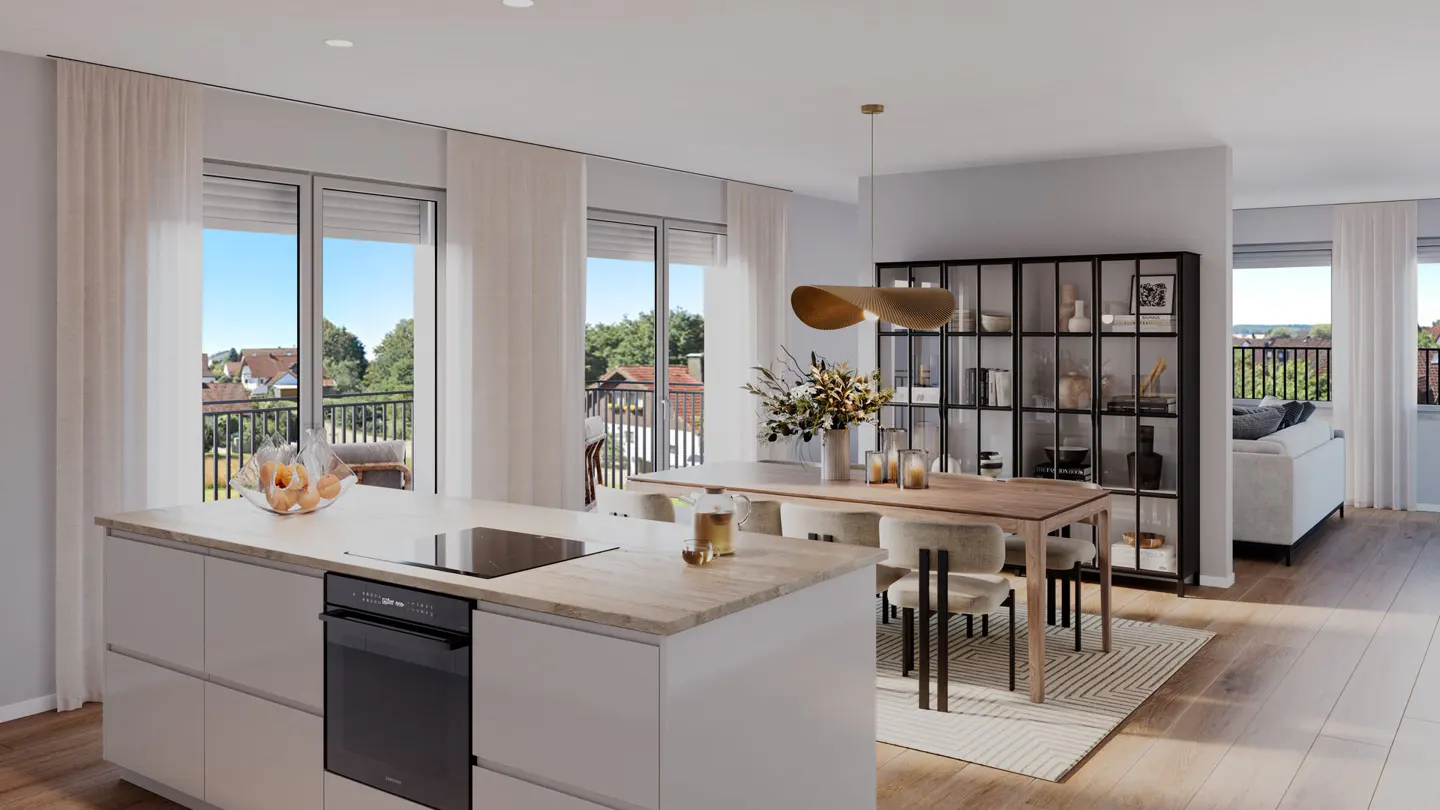 Modern open-plan kitchen and dining area with a light wood island, dining table, and large windows overlooking a balcony.