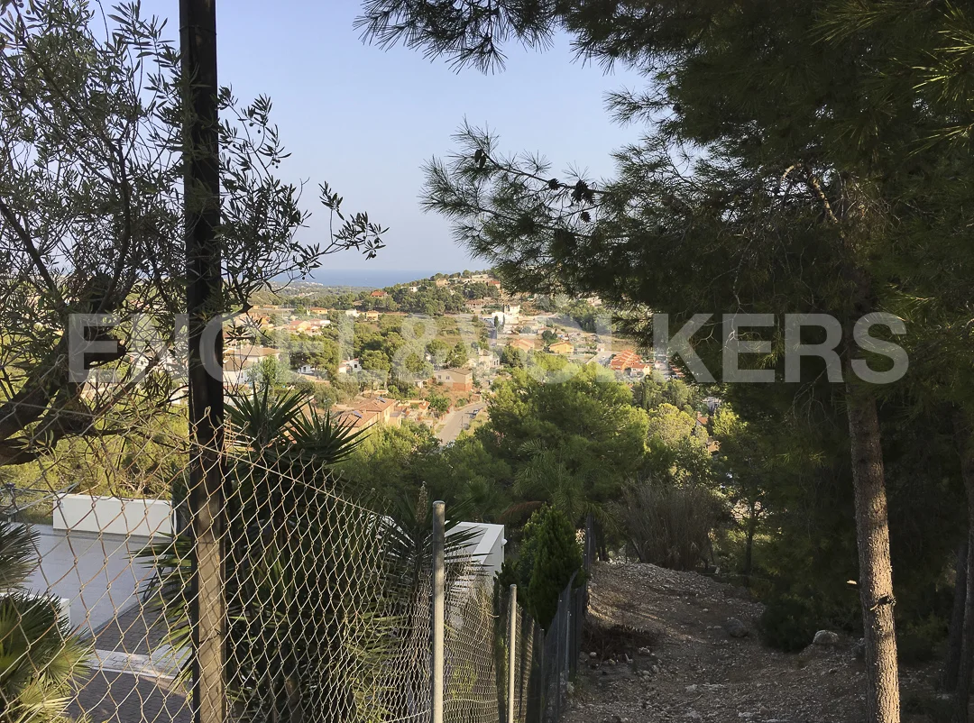 Large plot with sea and mountain views