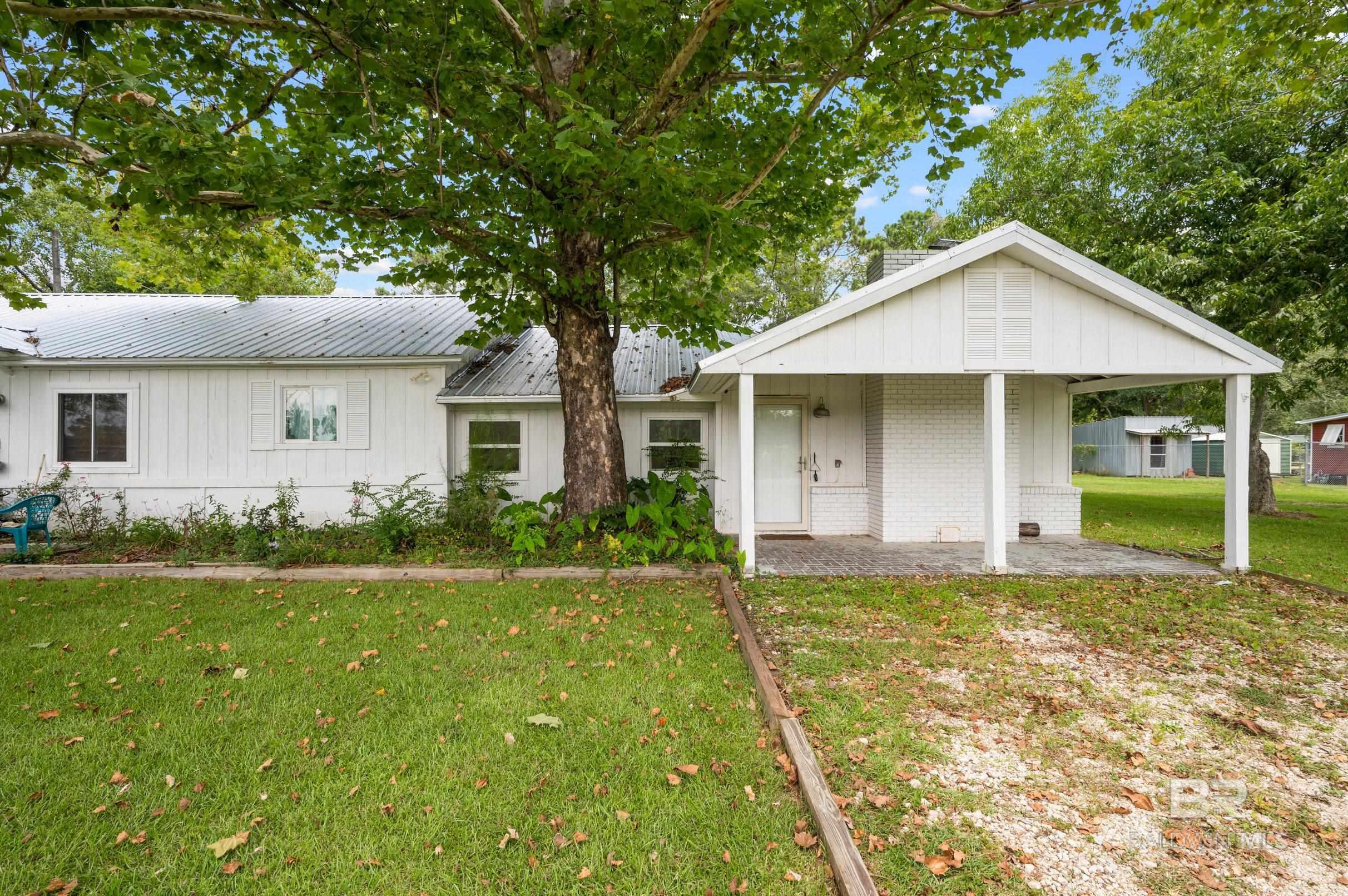 Income Potential Meets Farmhouse Charm in Elberta