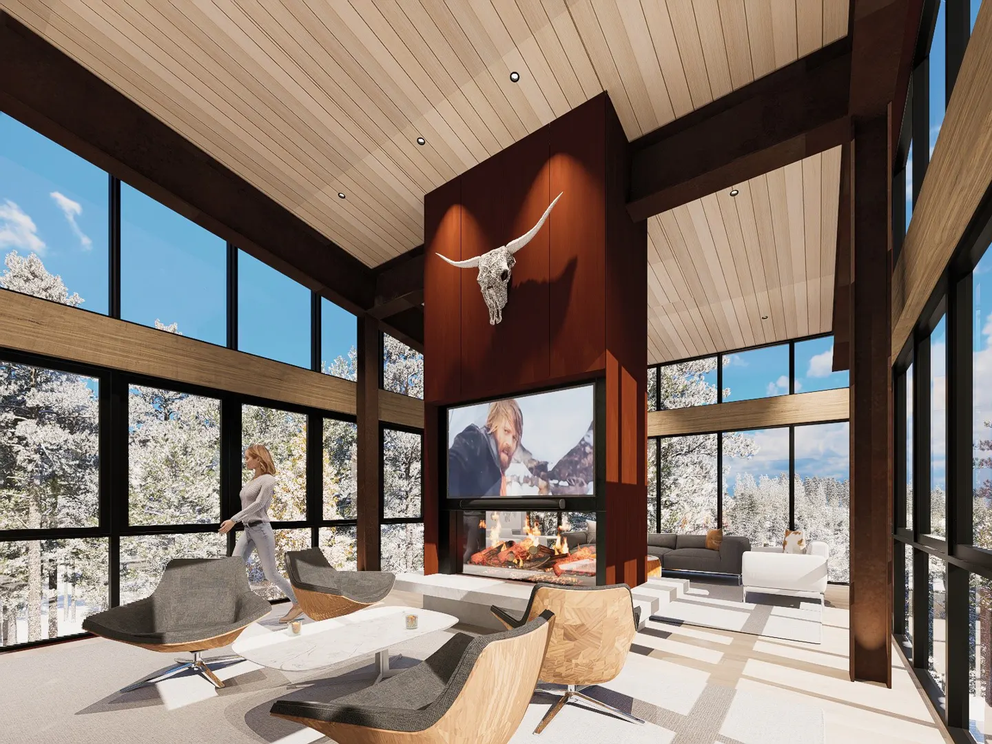 A modern living room with a fireplace, TV, and bull skull decoration. Large windows offer a view of snow-covered trees. A woman walks by.