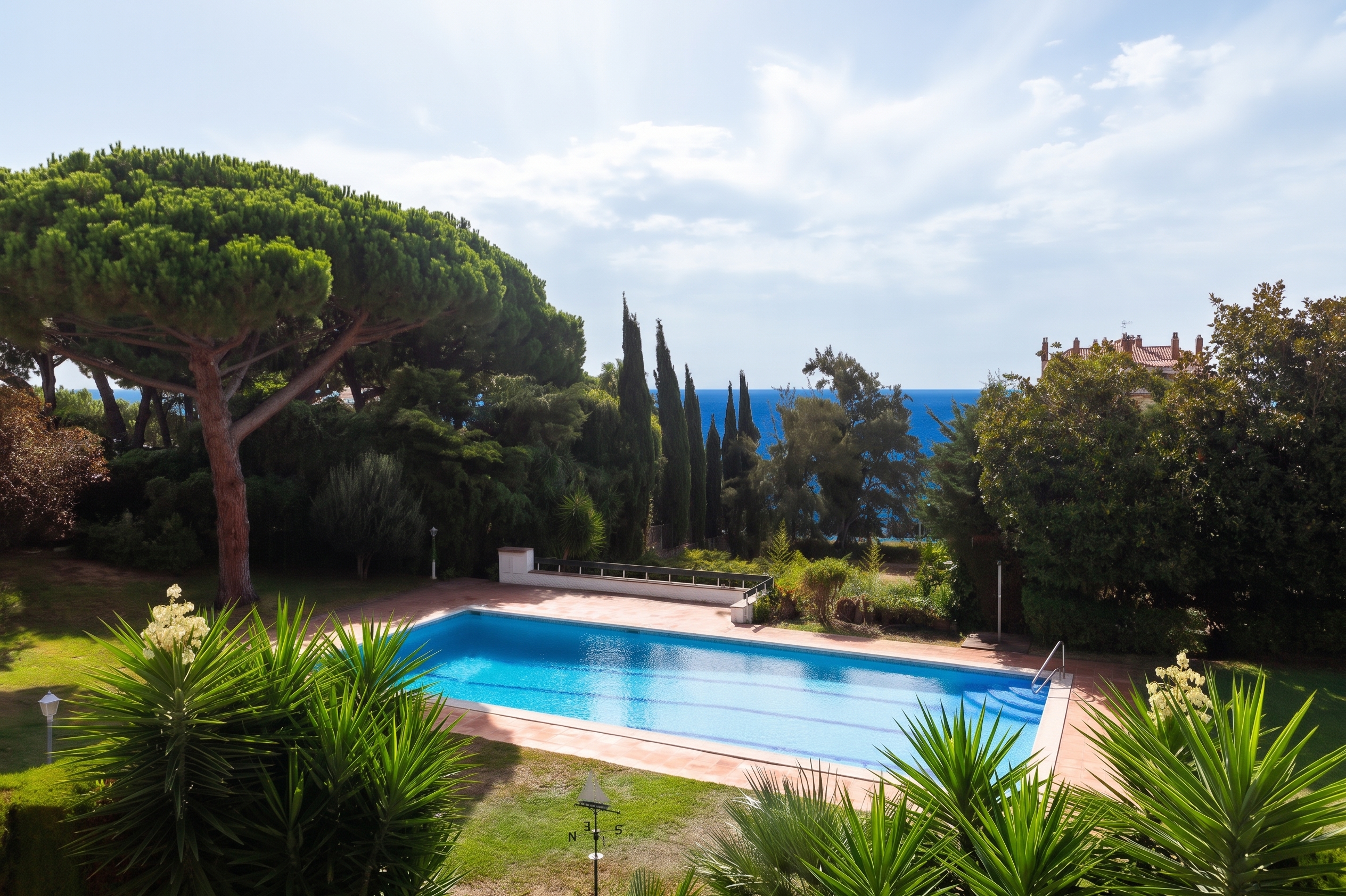 Spectacular designer home with garden, communal pool, and sea views in Llavaneras