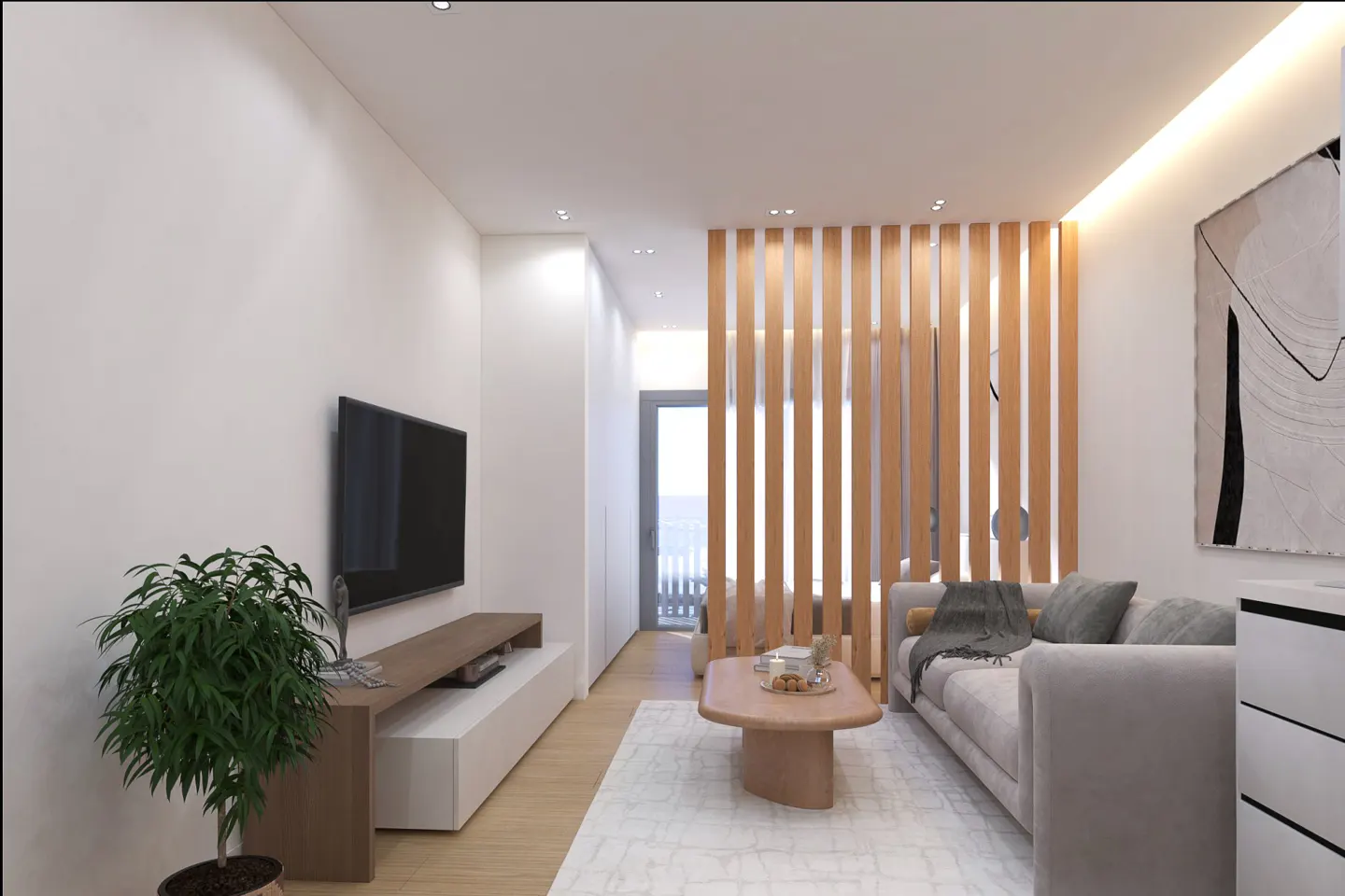 Living room with a gray sofa, wood slat wall, and a TV on a white wall. A coffee table sits on a white rug.
