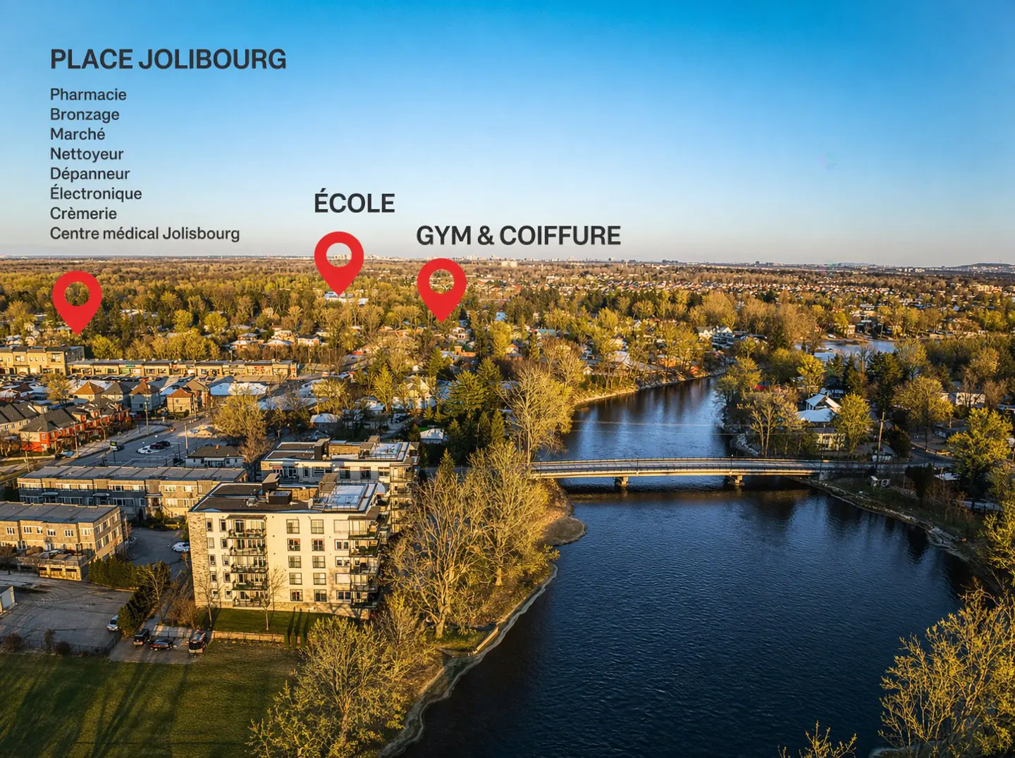 Aerial view of Place Jolibourg, showing buildings, a river with a bridge, and red map markers for school, gym, and coiffure.