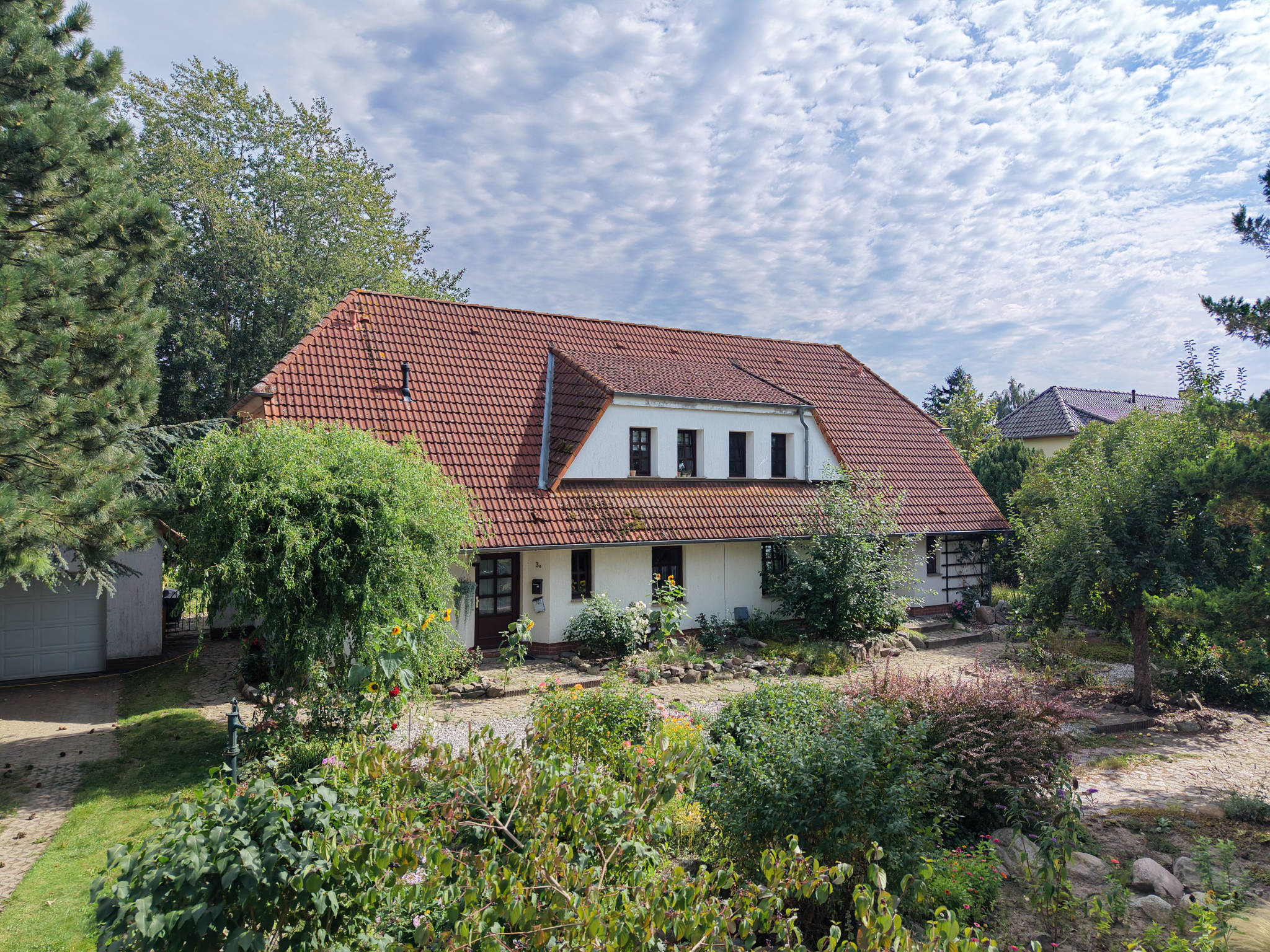 Mehrfamilienhaus mit parkähnlichem Grundstück in Ostseenähe