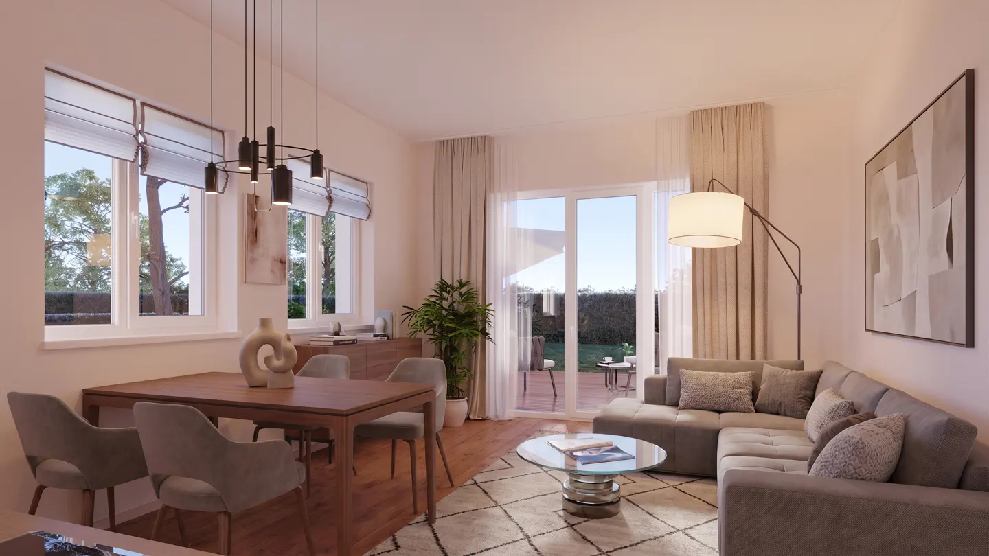 Living room with a wood dining table, grey chairs, and a grey sectional sofa. Large windows and a sliding glass door lead to a patio.