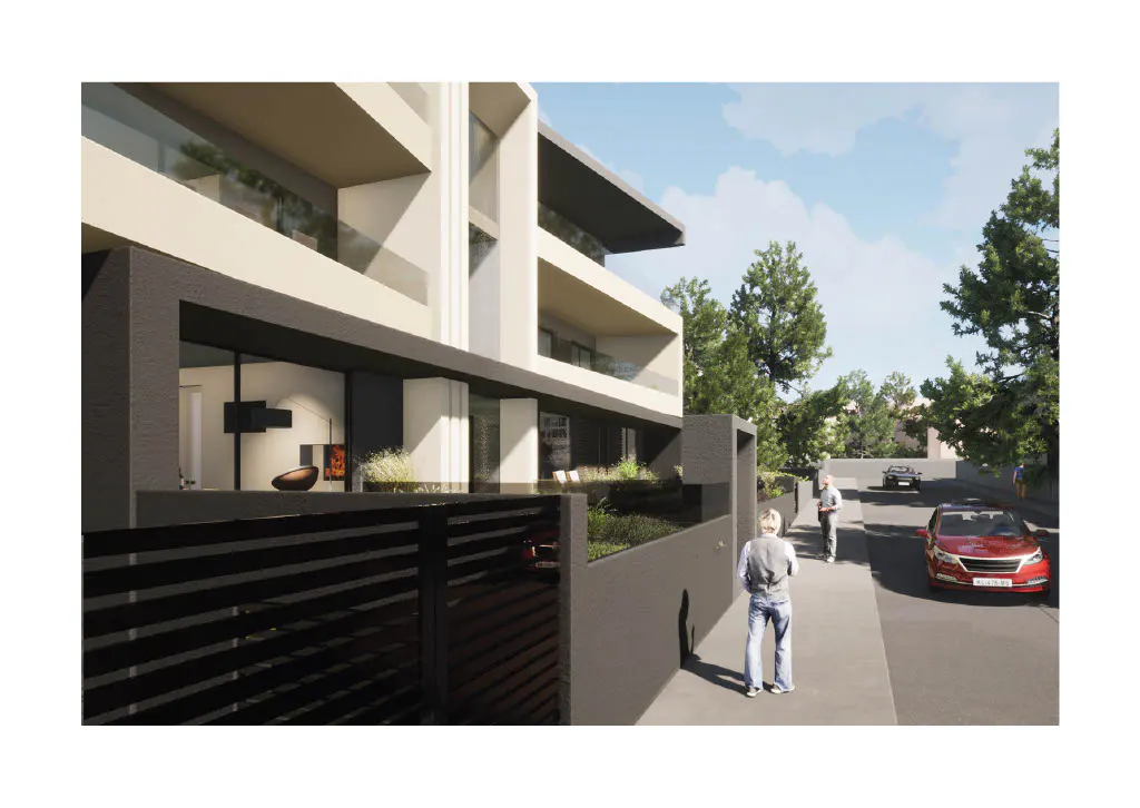 Modern three-story apartment building with balconies, black fence, and street view with cars and pedestrians.