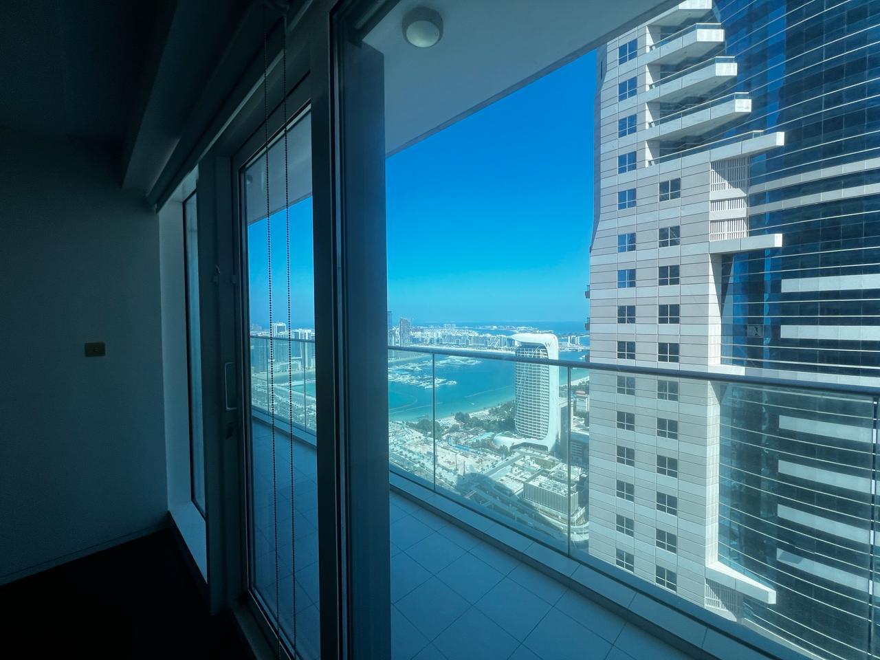 Unfurnished | Mid-floor | Partial sea-view