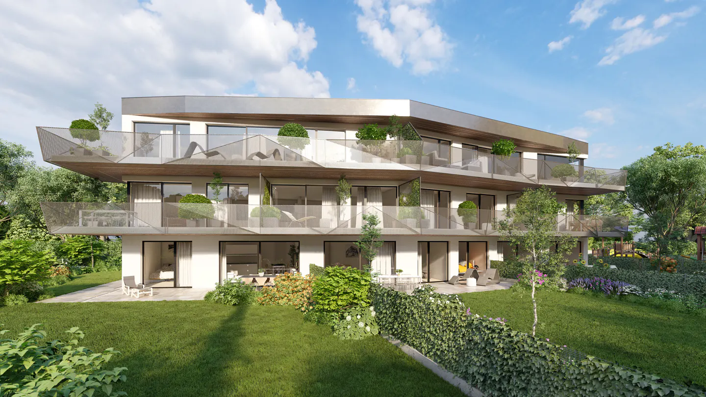 Modern three-story white apartment building with balconies, green lawn, and trees under a blue sky.