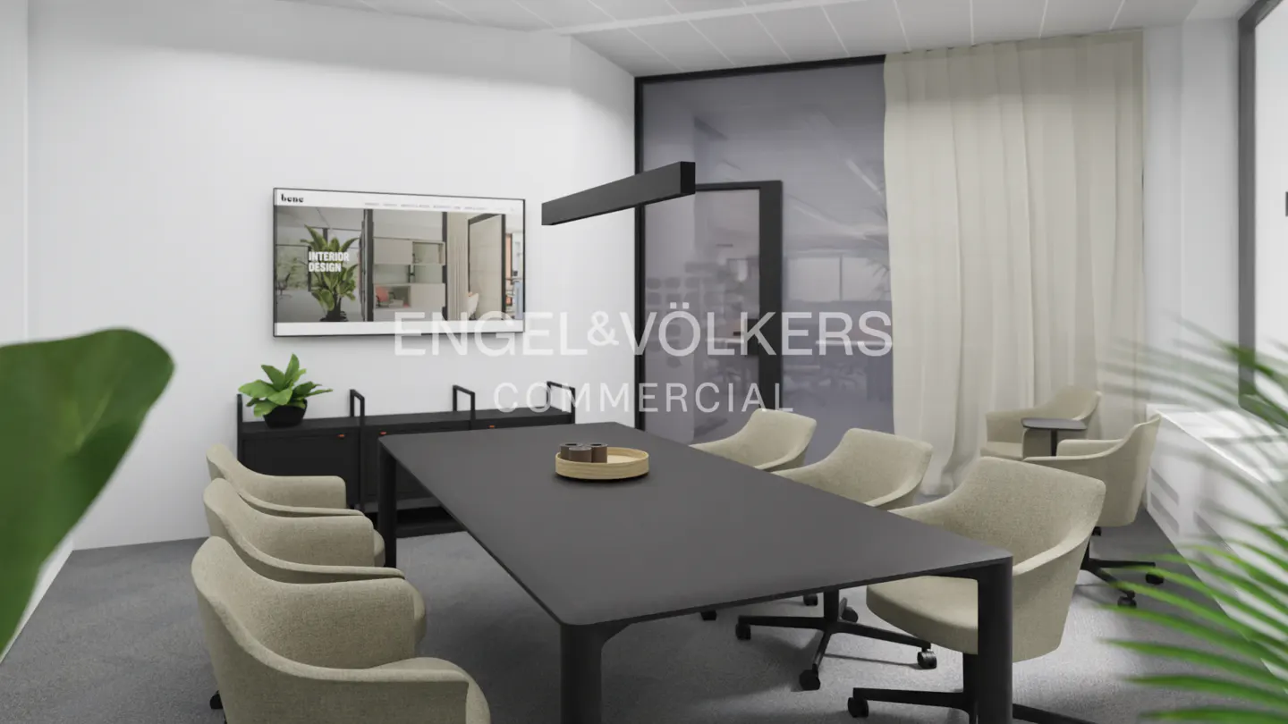 A modern conference room with a black table, beige chairs, and Engel & Völkers logo on the wall.