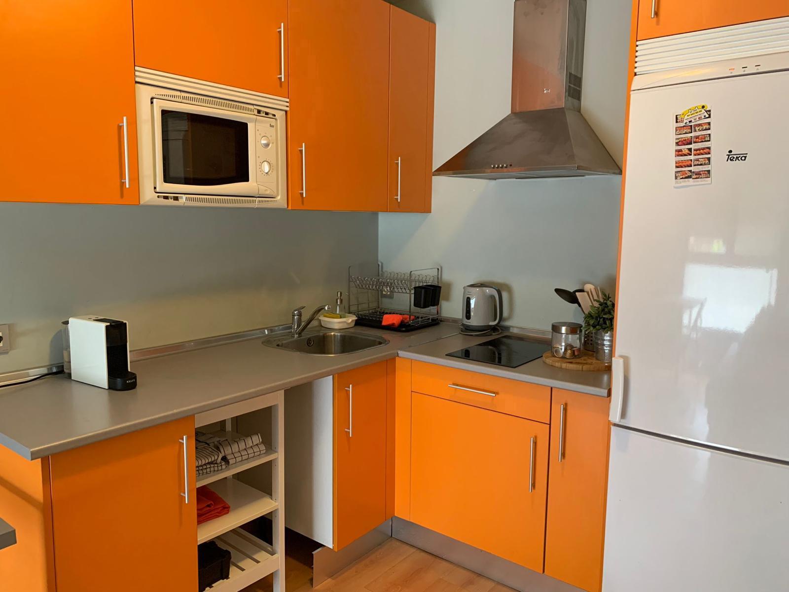 Cozy furnished home with garage, storage room and shared gym