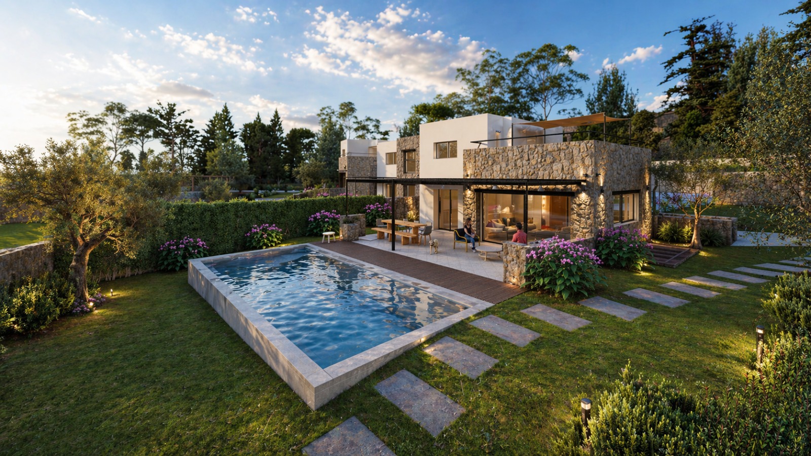 Backyard view of a modern stone house with a pool, patio, and lush green lawn under a blue sky.