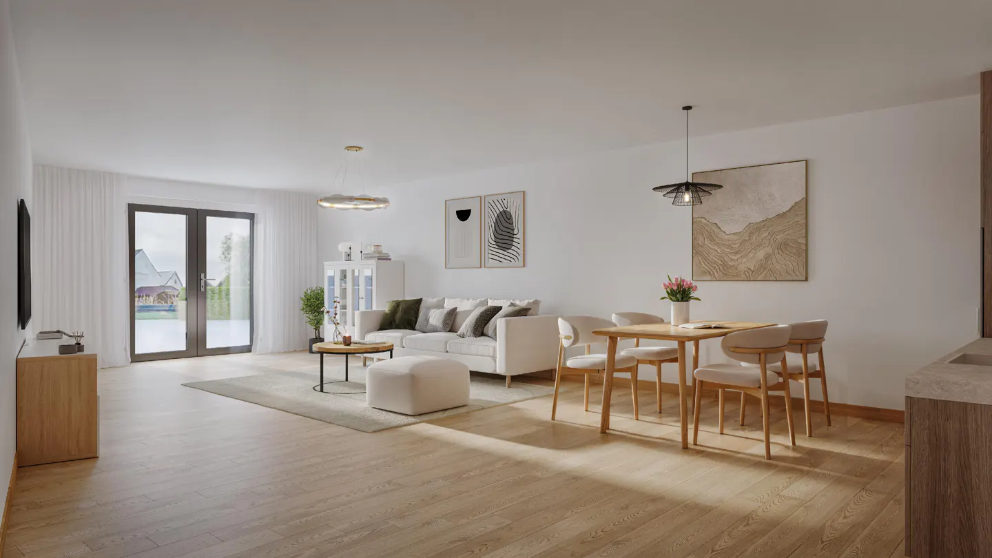 Bright, open-plan living space with light wood floors, white walls, and modern furniture. A dining table with four chairs sits near a white sofa and ottoman. Artwork adorns the walls.