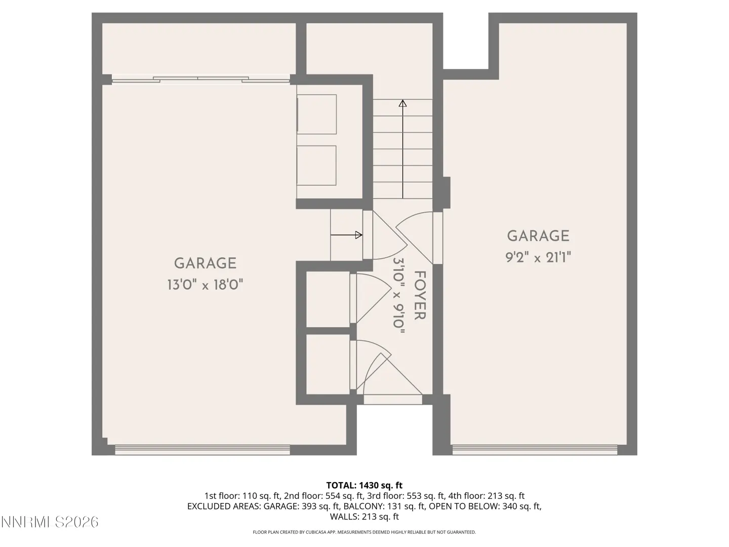 Floor plan showing a foyer and two garages, with stairs leading up and a total area of 1,430 square feet.