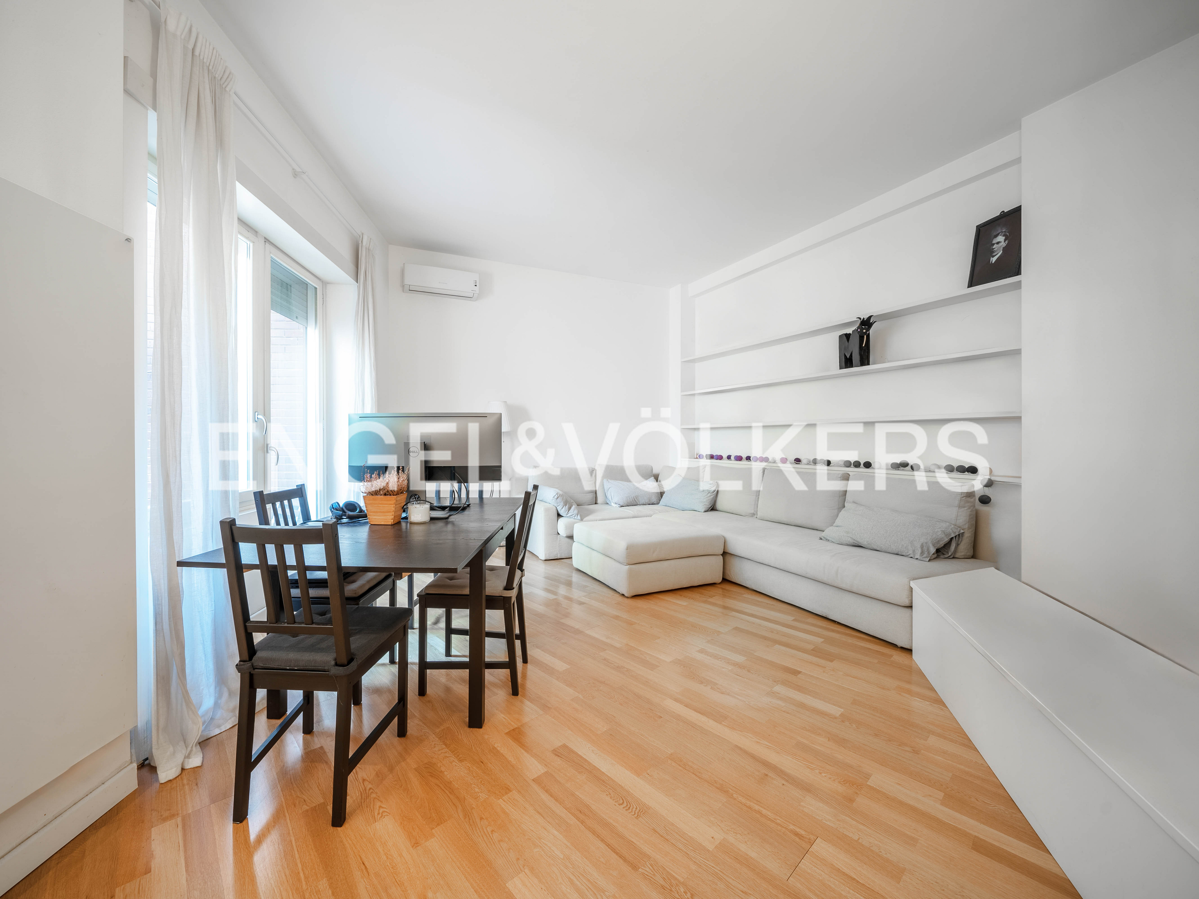 Modern one-bedroom apartment with a small terrace on Sismondi Street