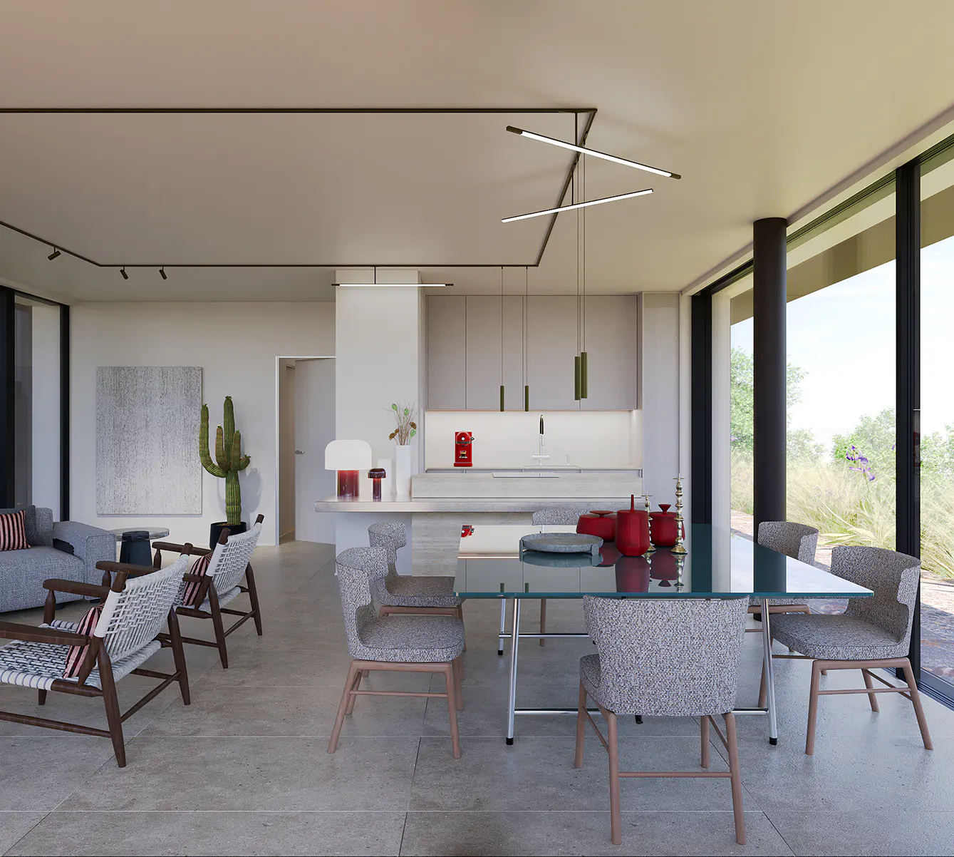 A modern, open-concept living space with a glass dining table surrounded by patterned chairs. A kitchen area is visible in the background. Large windows offer a view of greenery.