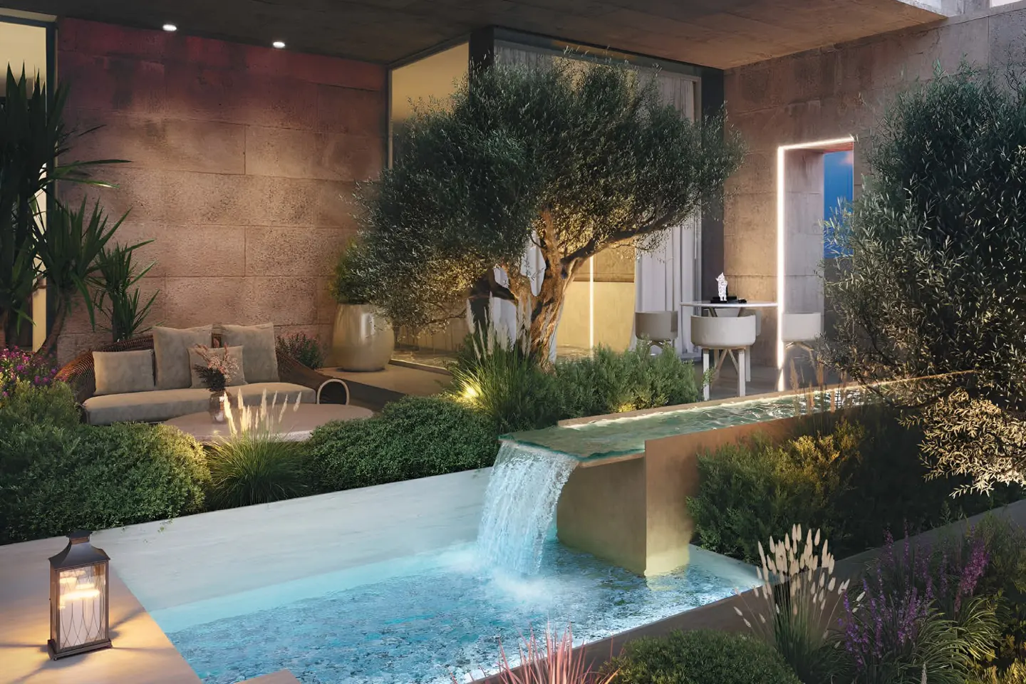 Modern patio with a small waterfall, reflecting pool, lush greenery, olive tree, and comfortable outdoor seating area.