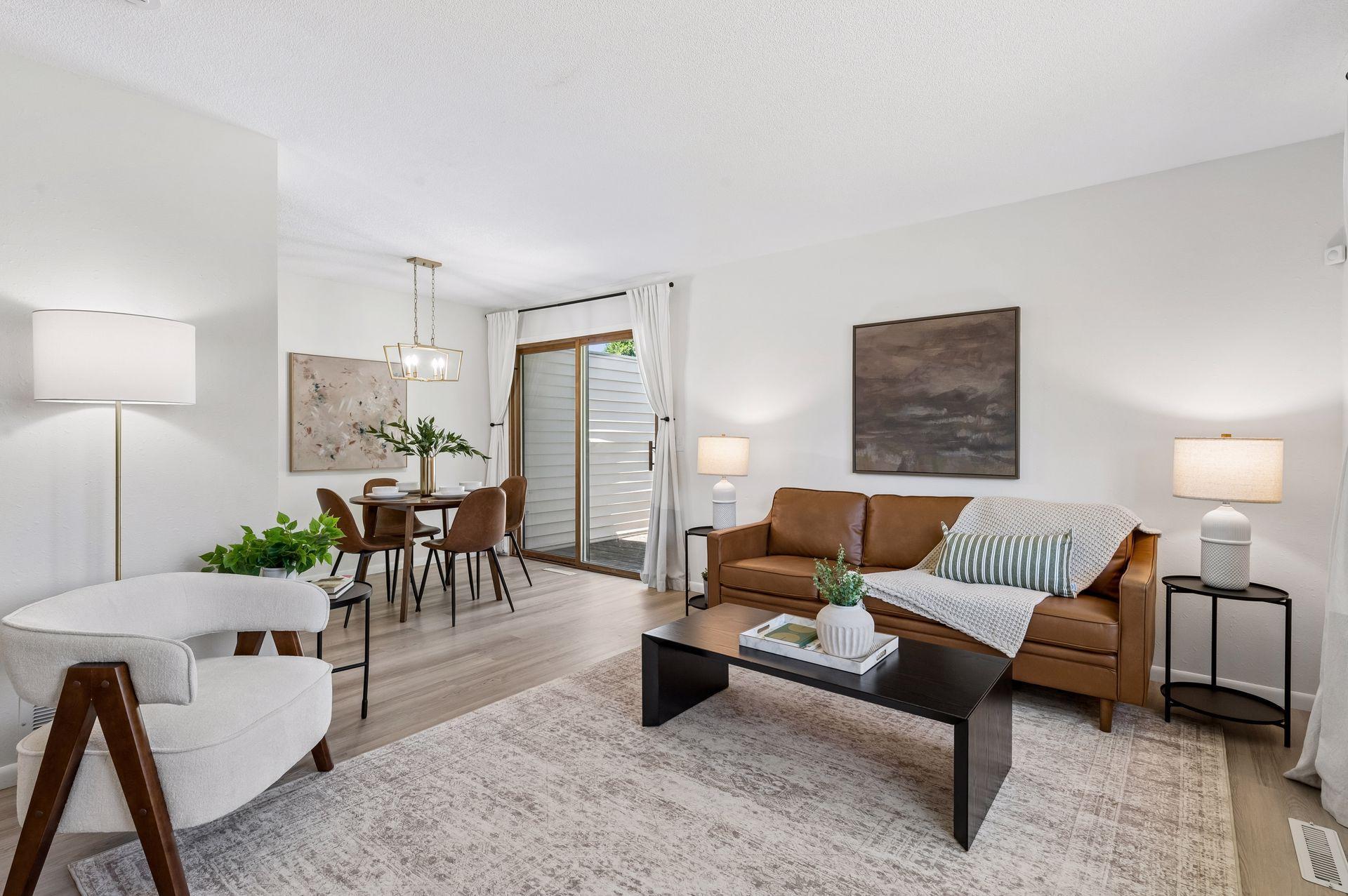 Modernized Luxe Townhome: Granite & Wood Fireplace