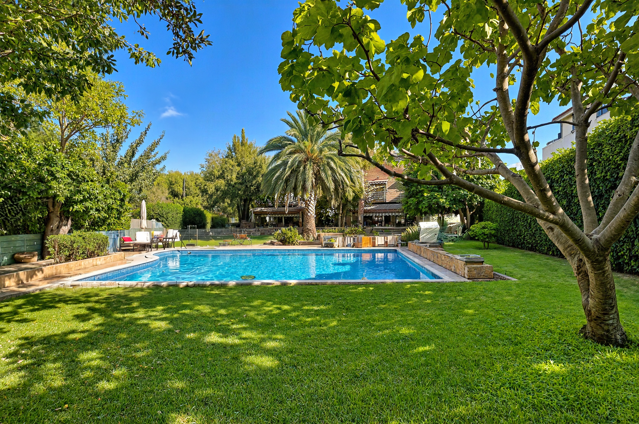 A Unique Property: Two Connected Houses with a Large Garden and Swimming Pool [AI-modified]