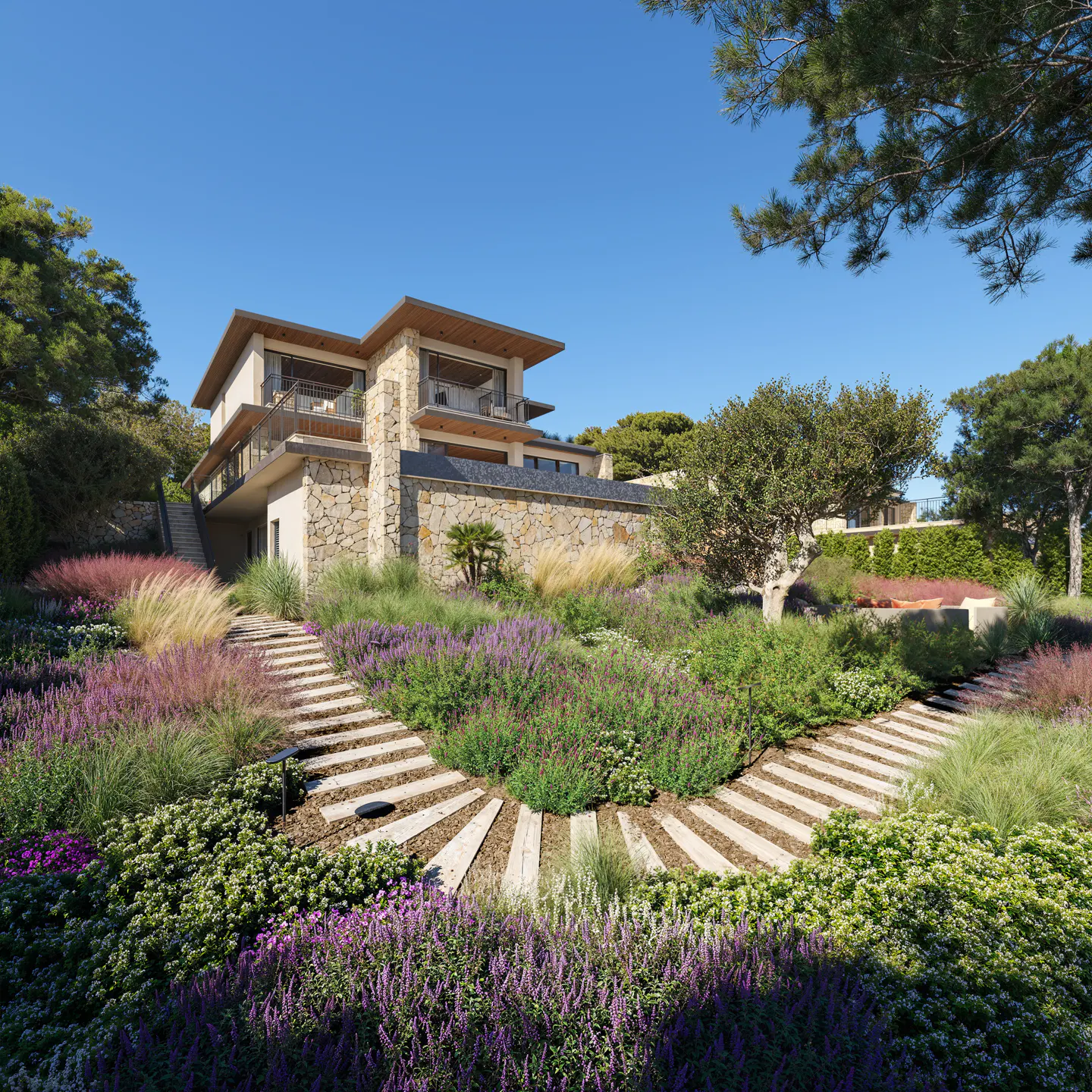Two-story stone house with a wooden roof, surrounded by a garden with purple flowers and a stone path.