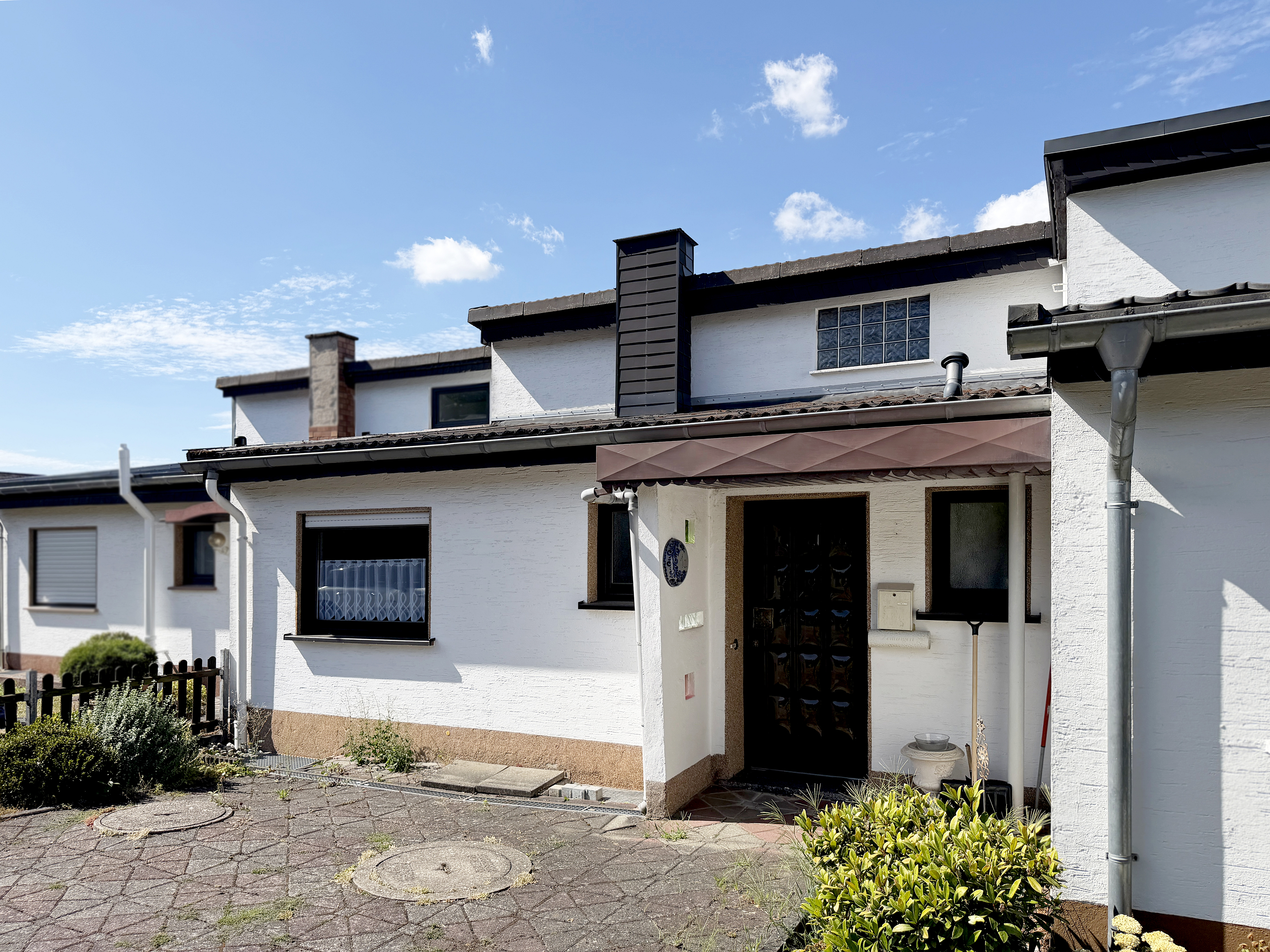 Split-Level Eigentumswohnung mit Haus-Charakter in beliebter Wohnlage