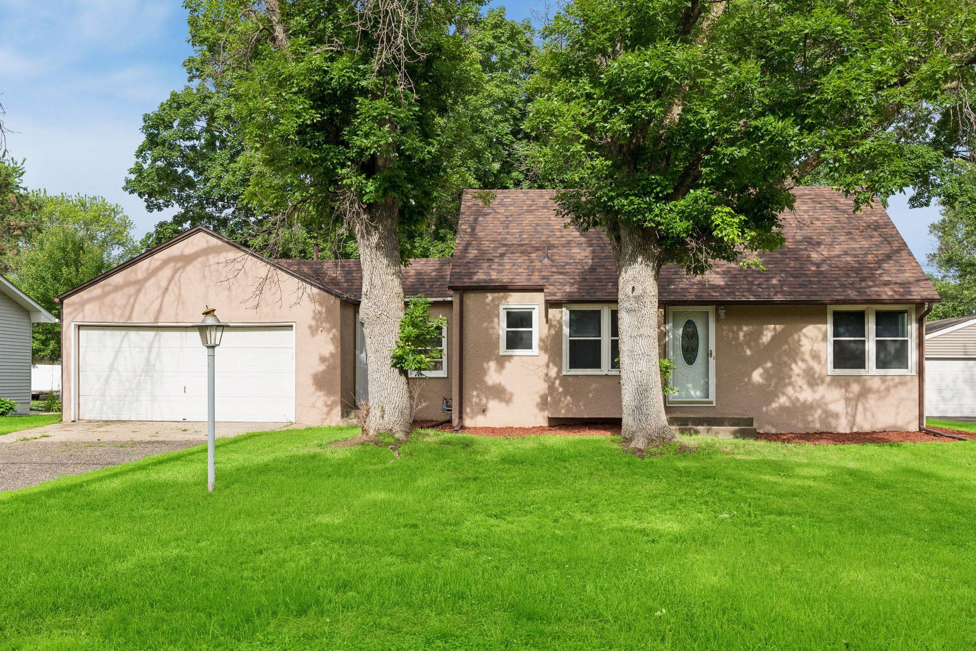 Understated Warmth and Rich Woods in Maple Grove