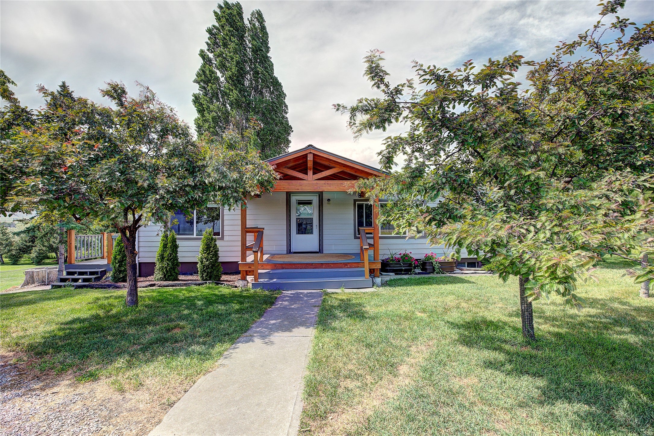 Spacious Home with Shop & Guest Suite on Fenced Acreage